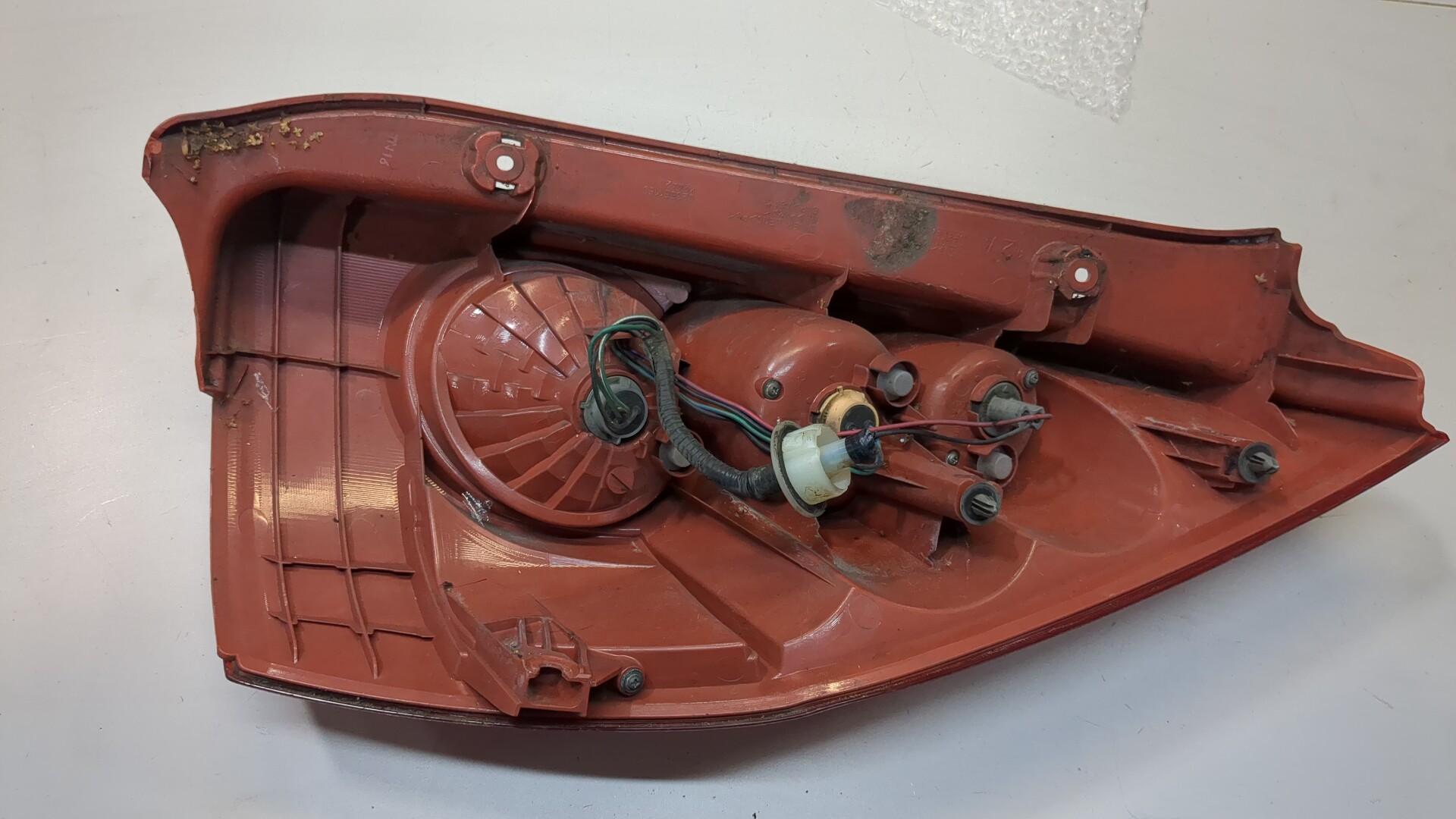 Фонарь задний левый