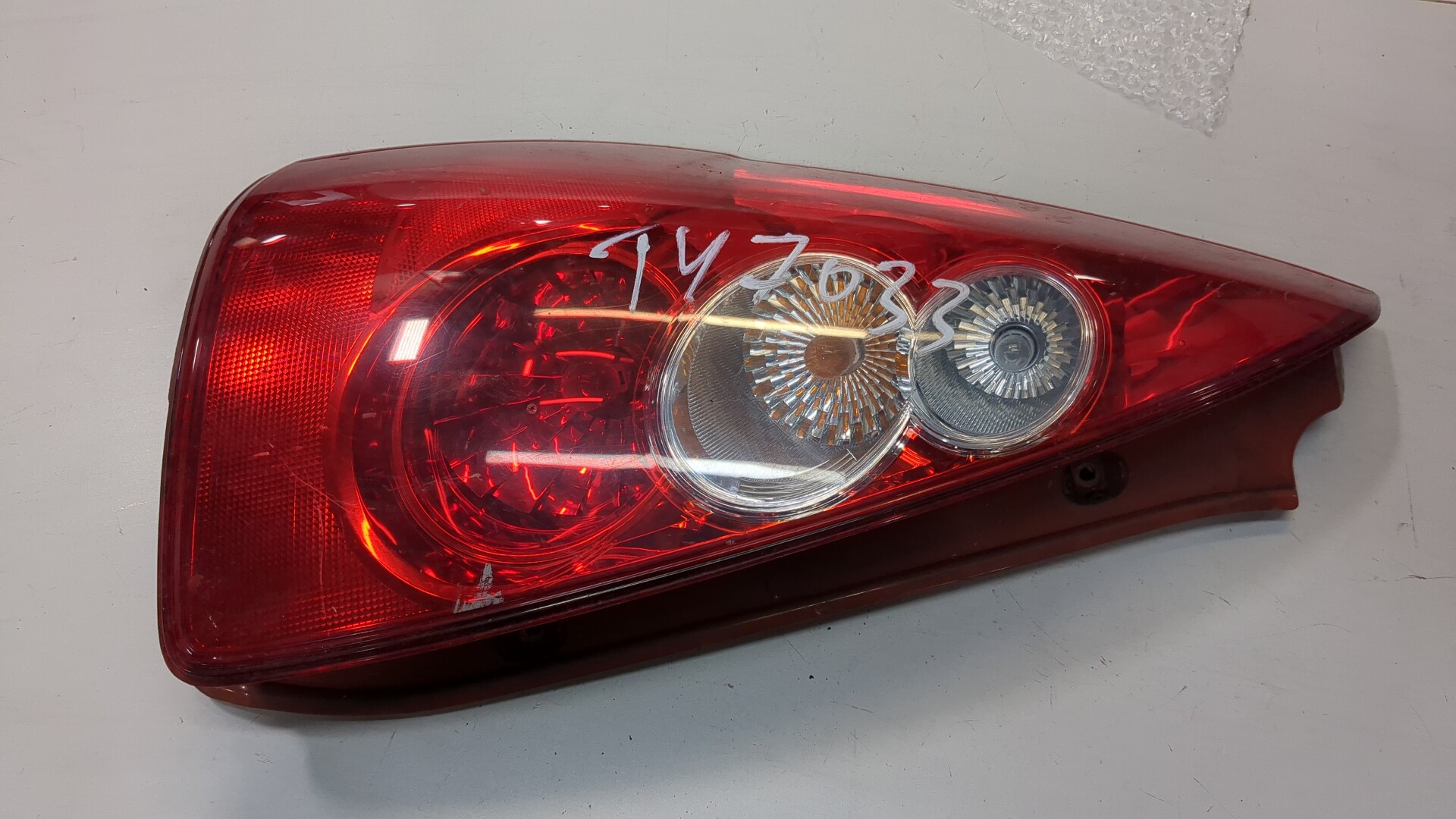 Фонарь задний левый