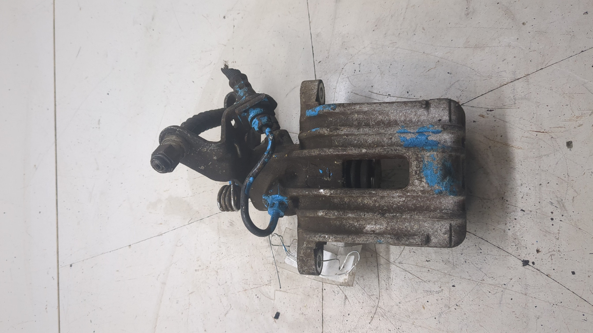 Суппорт задний левый