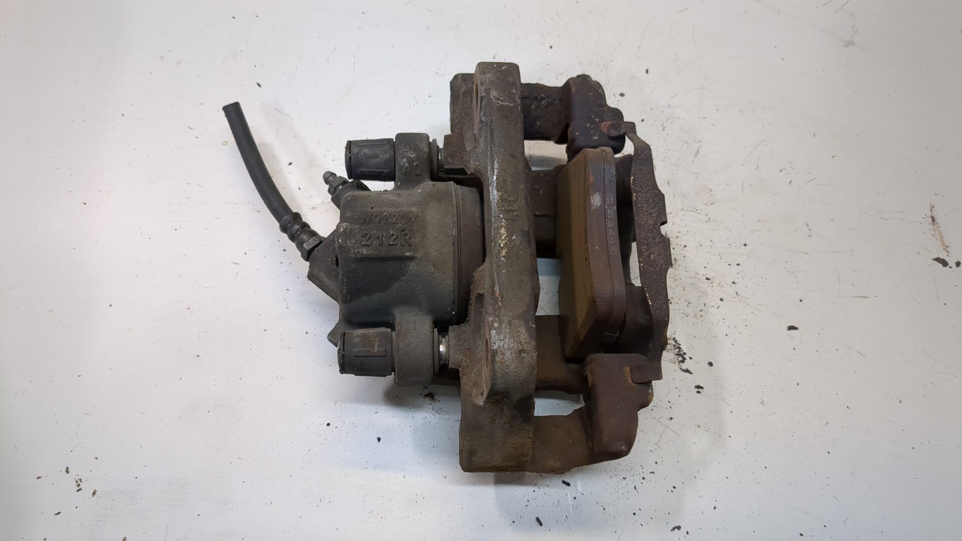 Суппорт передний левый