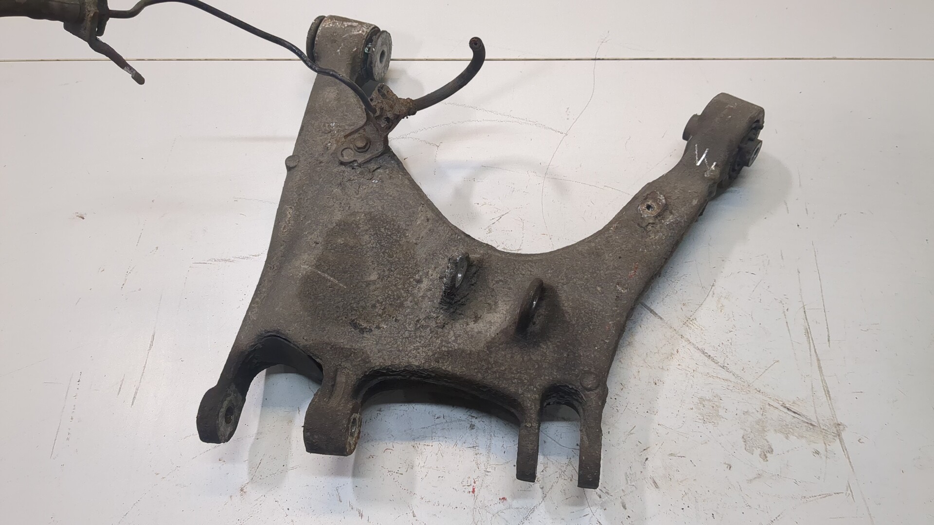 Рычаг задний левый