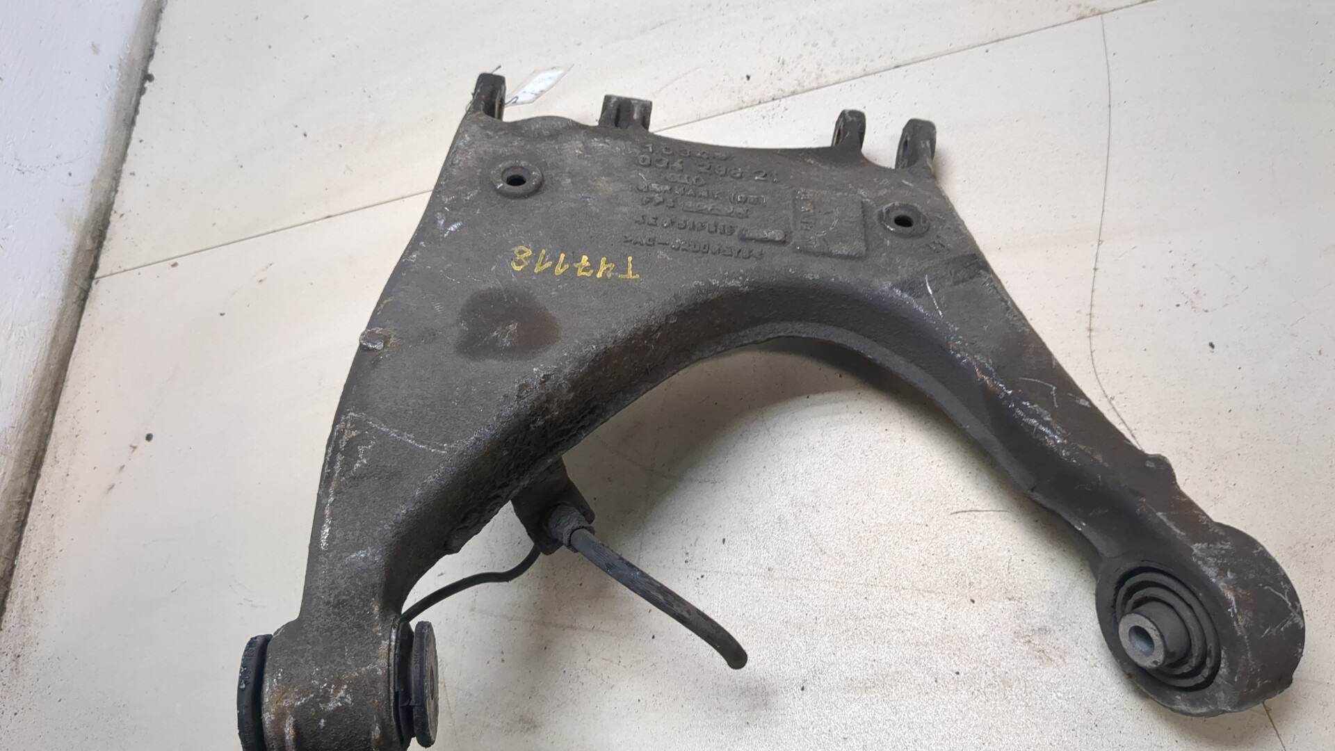 Рычаг задний левый