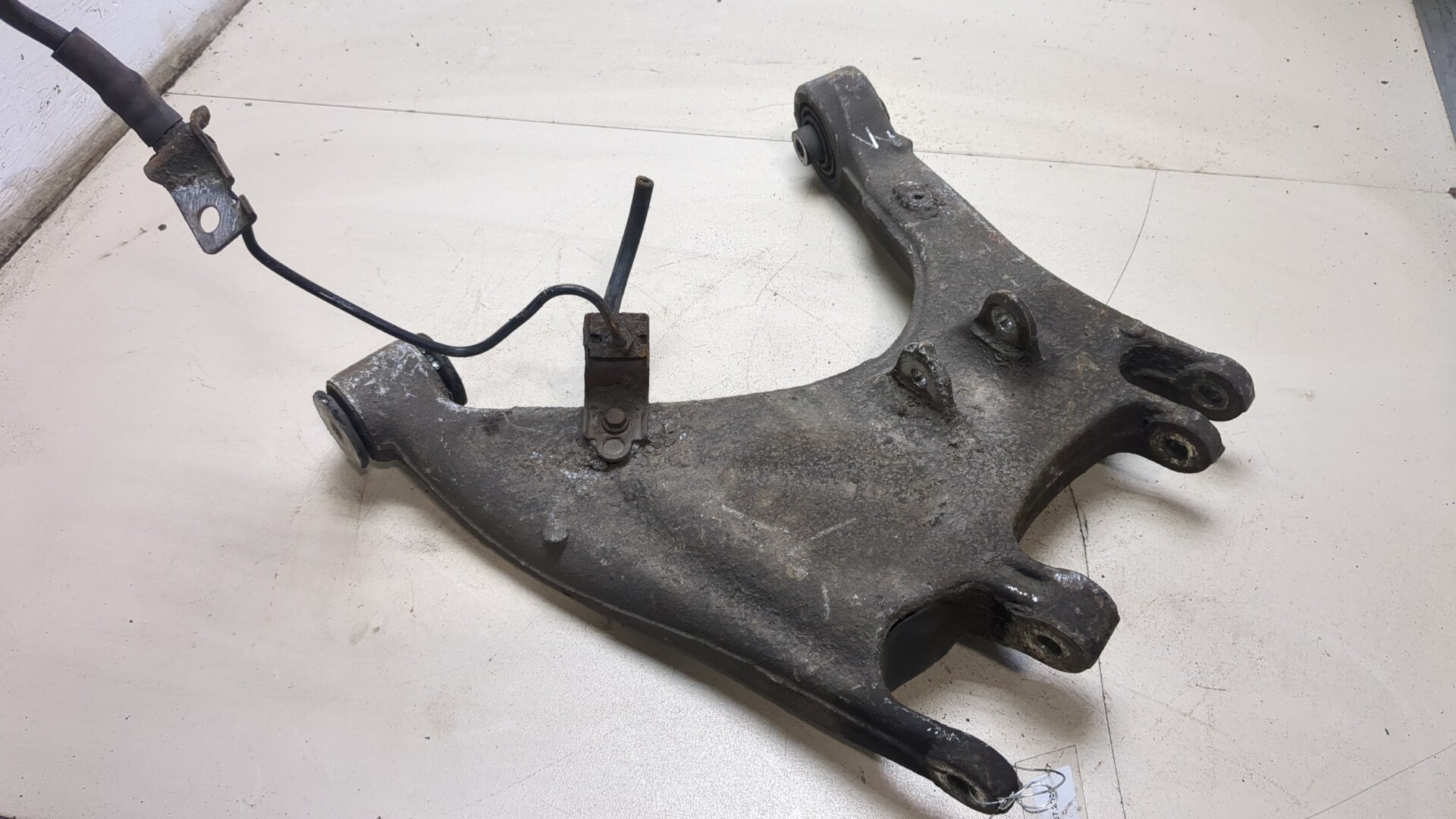 Рычаг задний левый