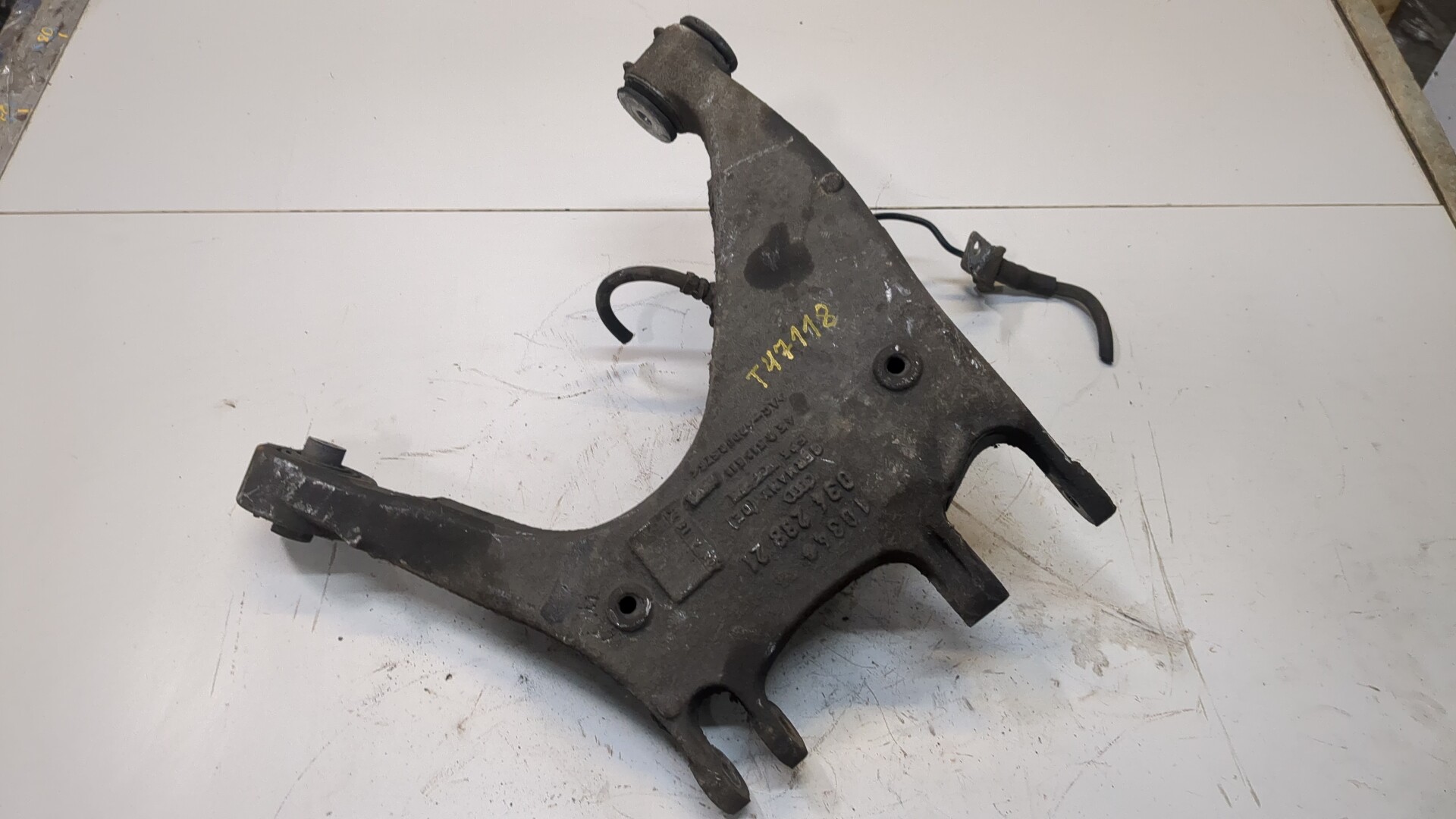 Рычаг задний левый