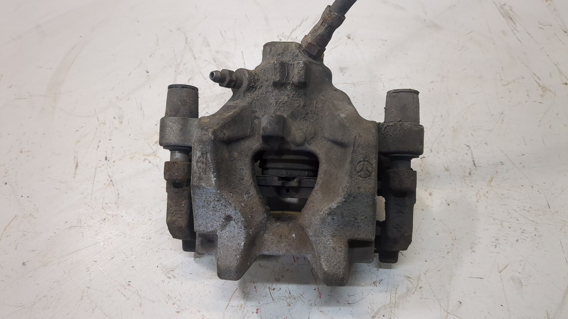 Суппорт задний левый