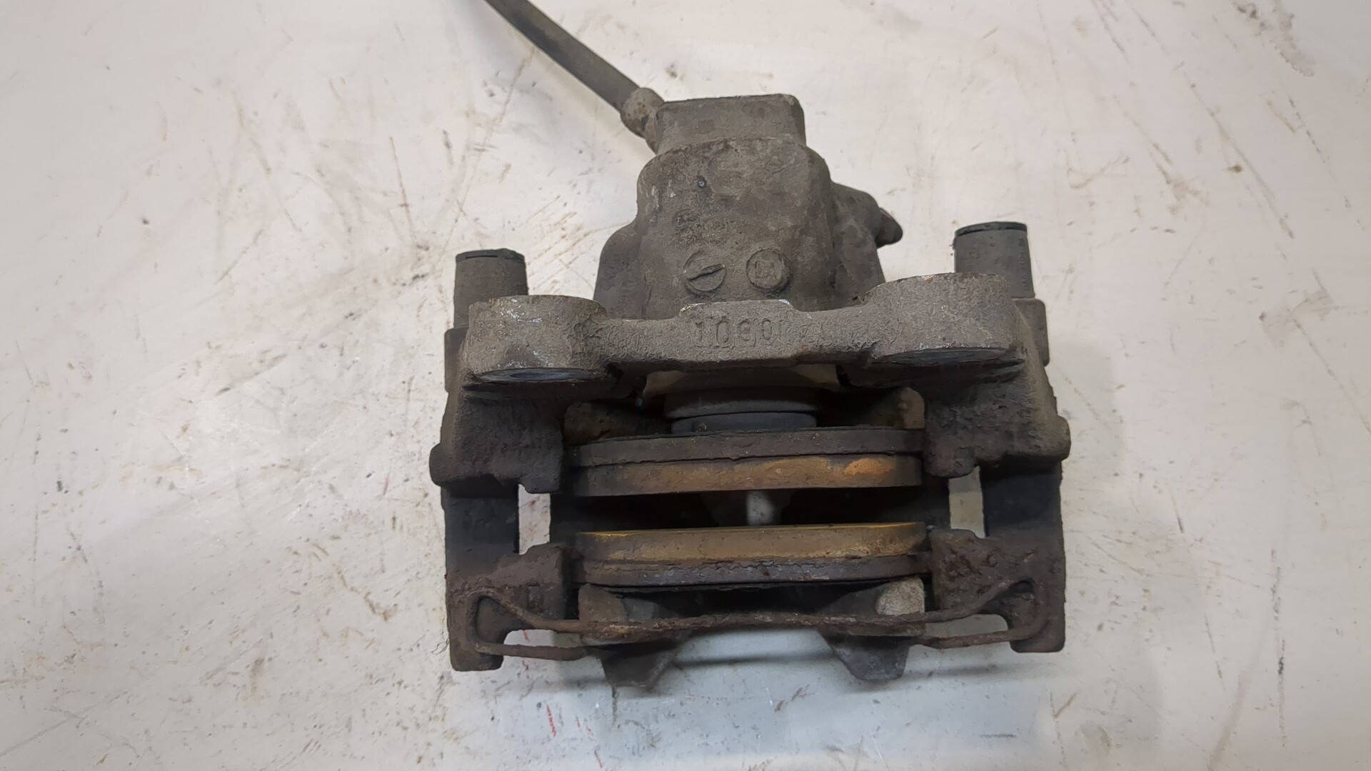 Суппорт задний левый