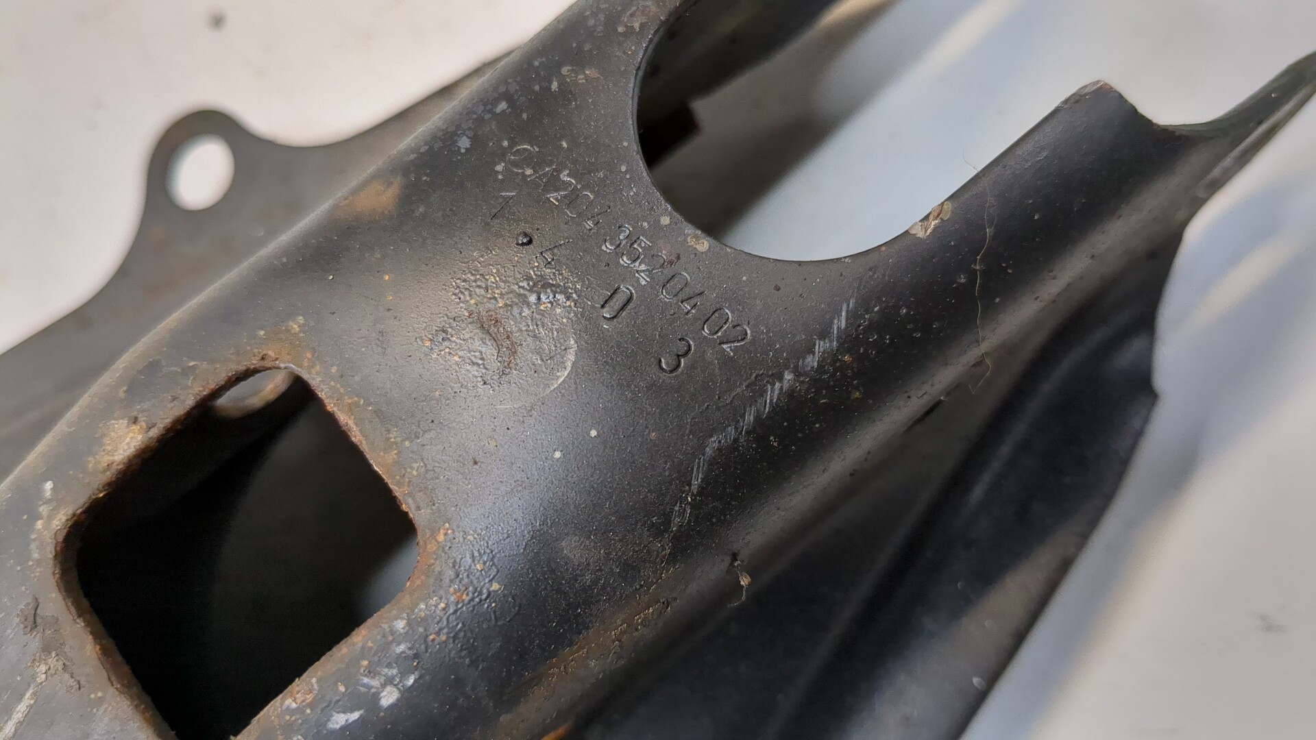 Рычаг задний