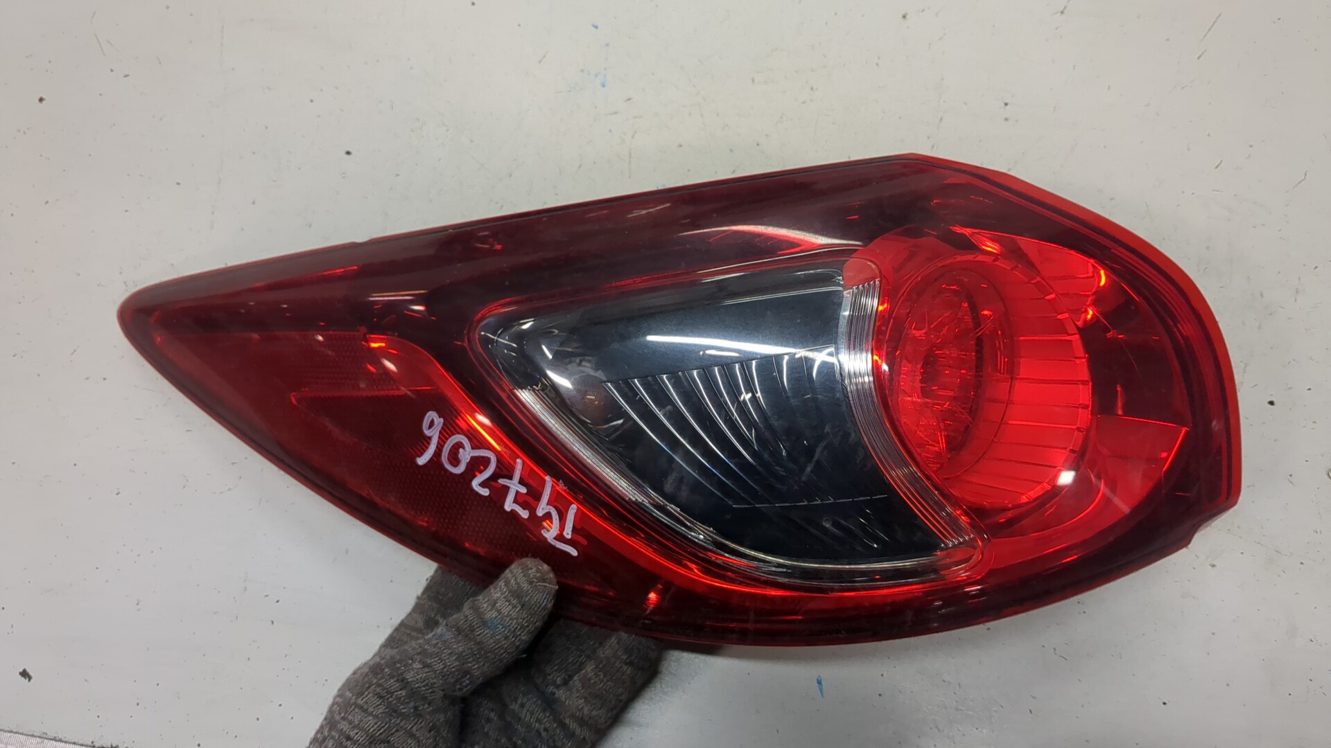 Фонарь задний левый