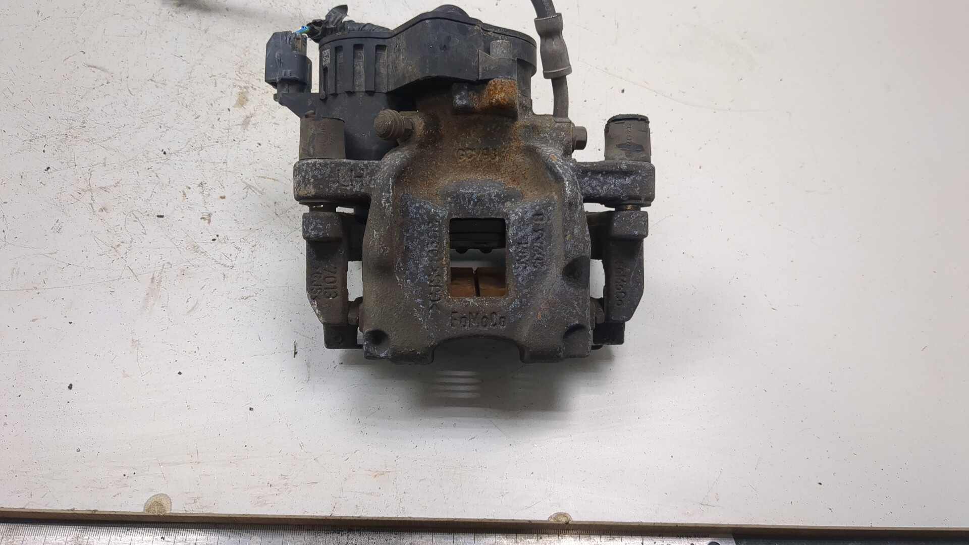 Суппорт задний левый