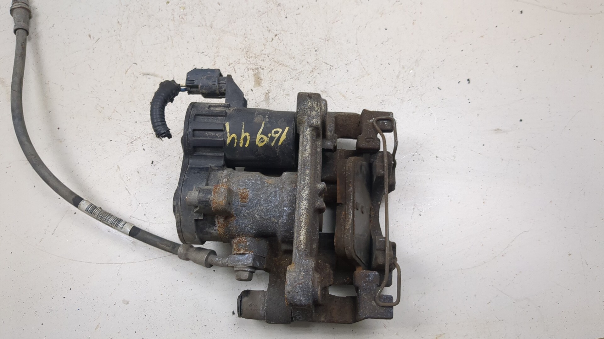 Суппорт задний левый