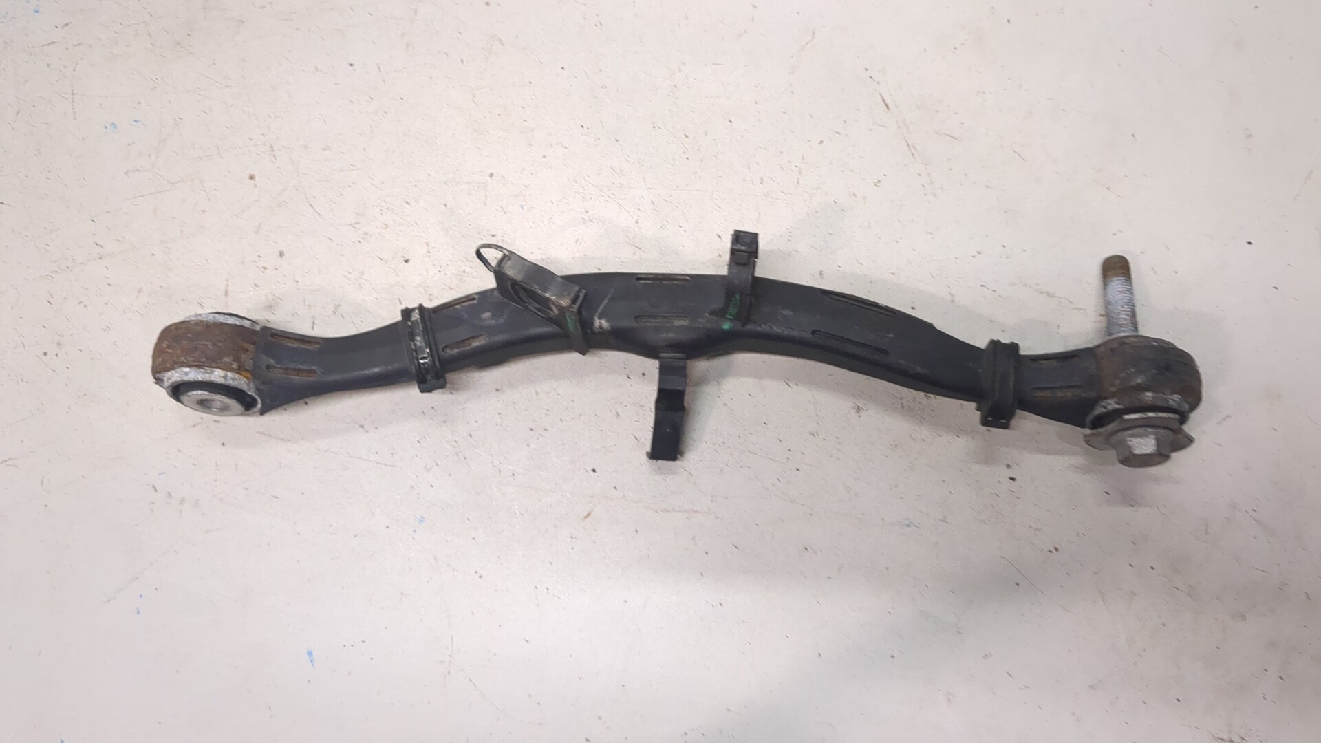 Рычаг задний левый