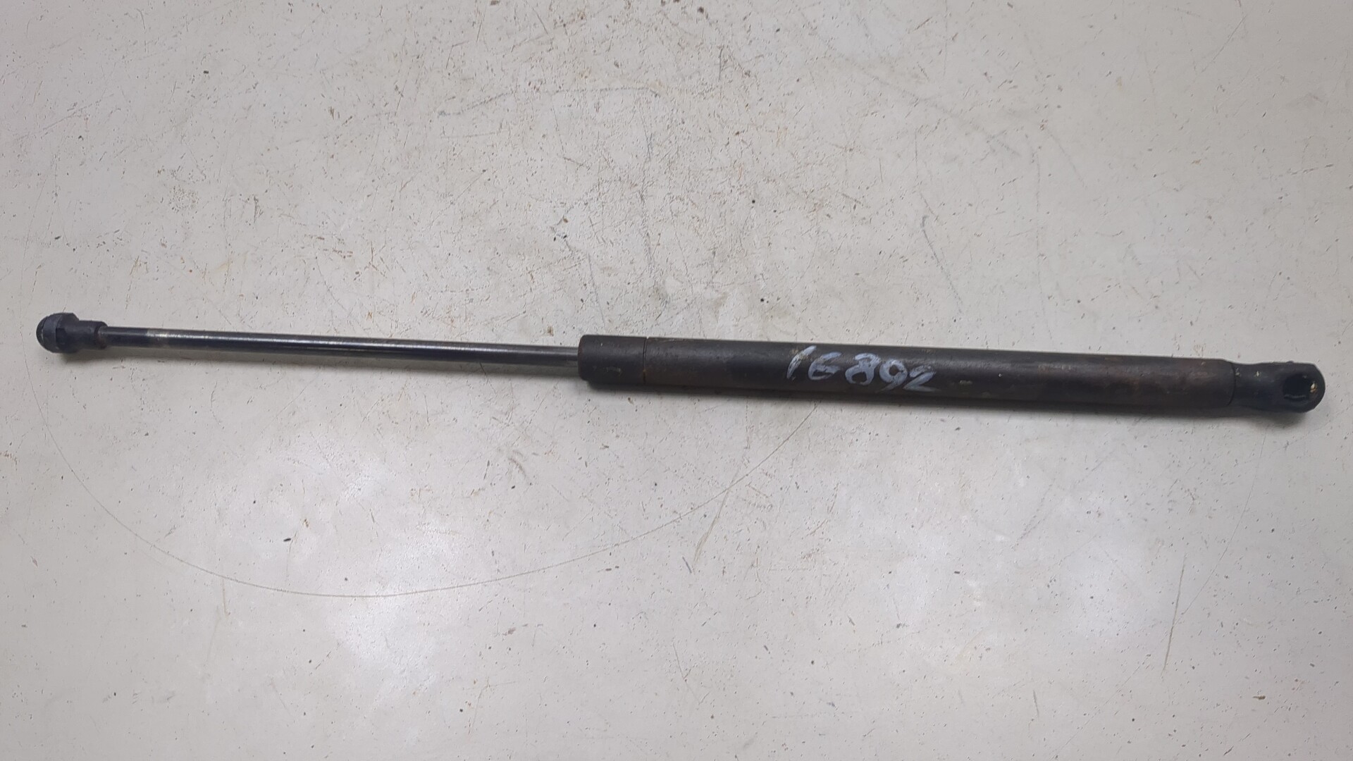 Амортизатор крышки багажника