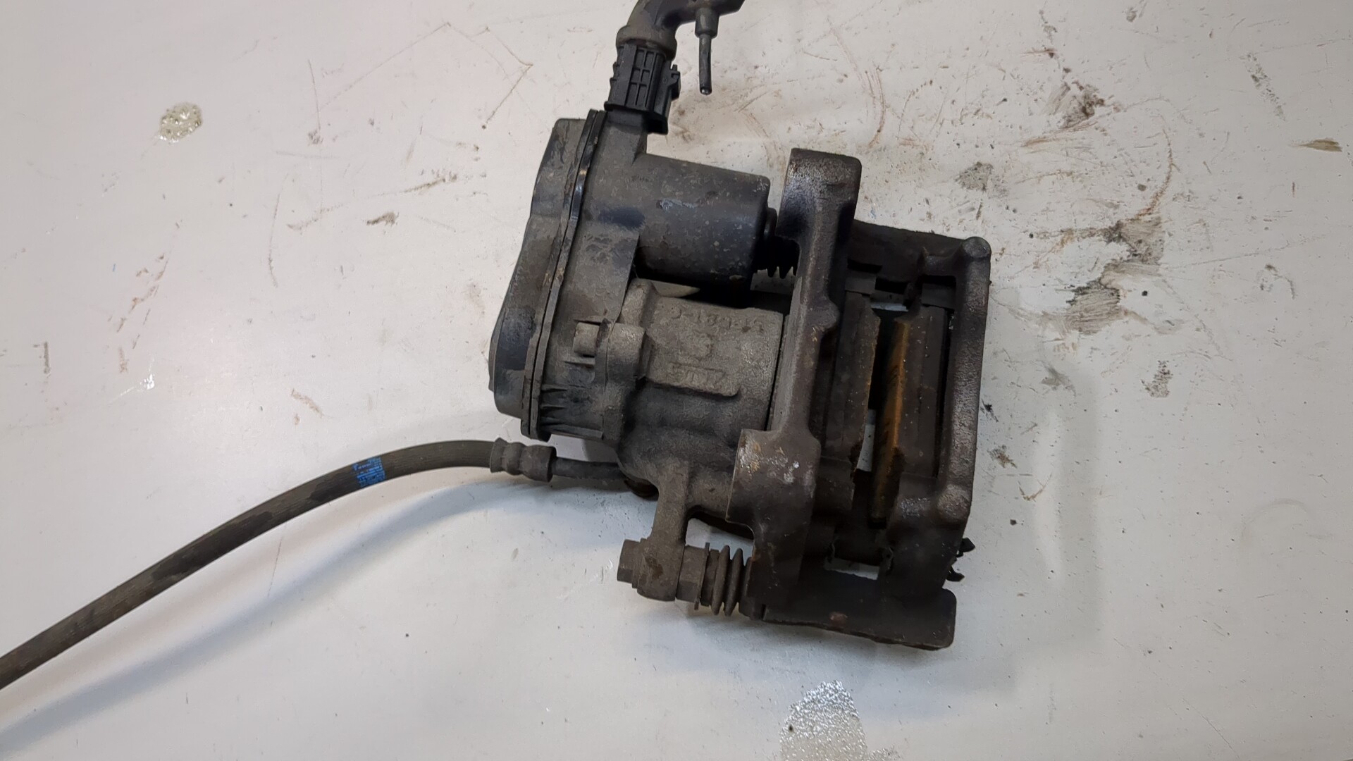 Суппорт задний левый