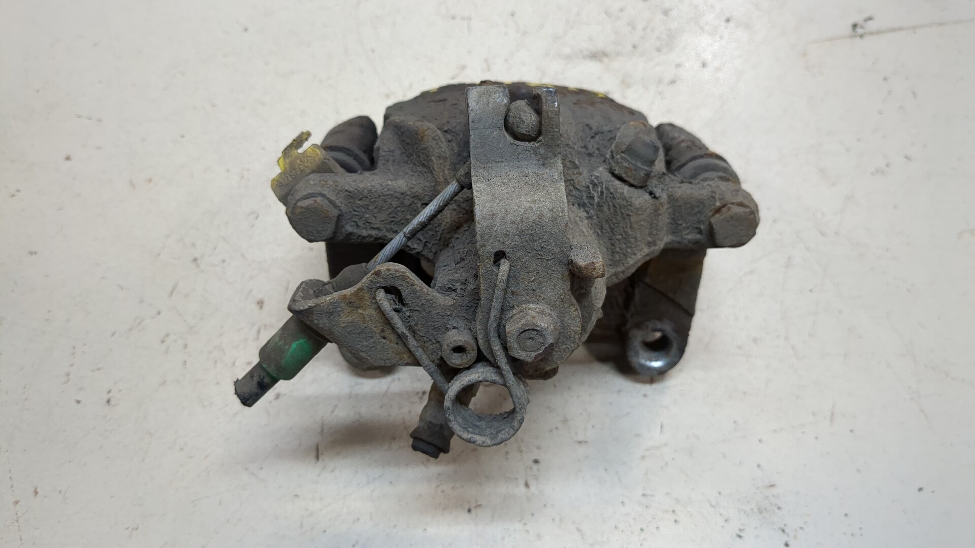 Суппорт задний левый