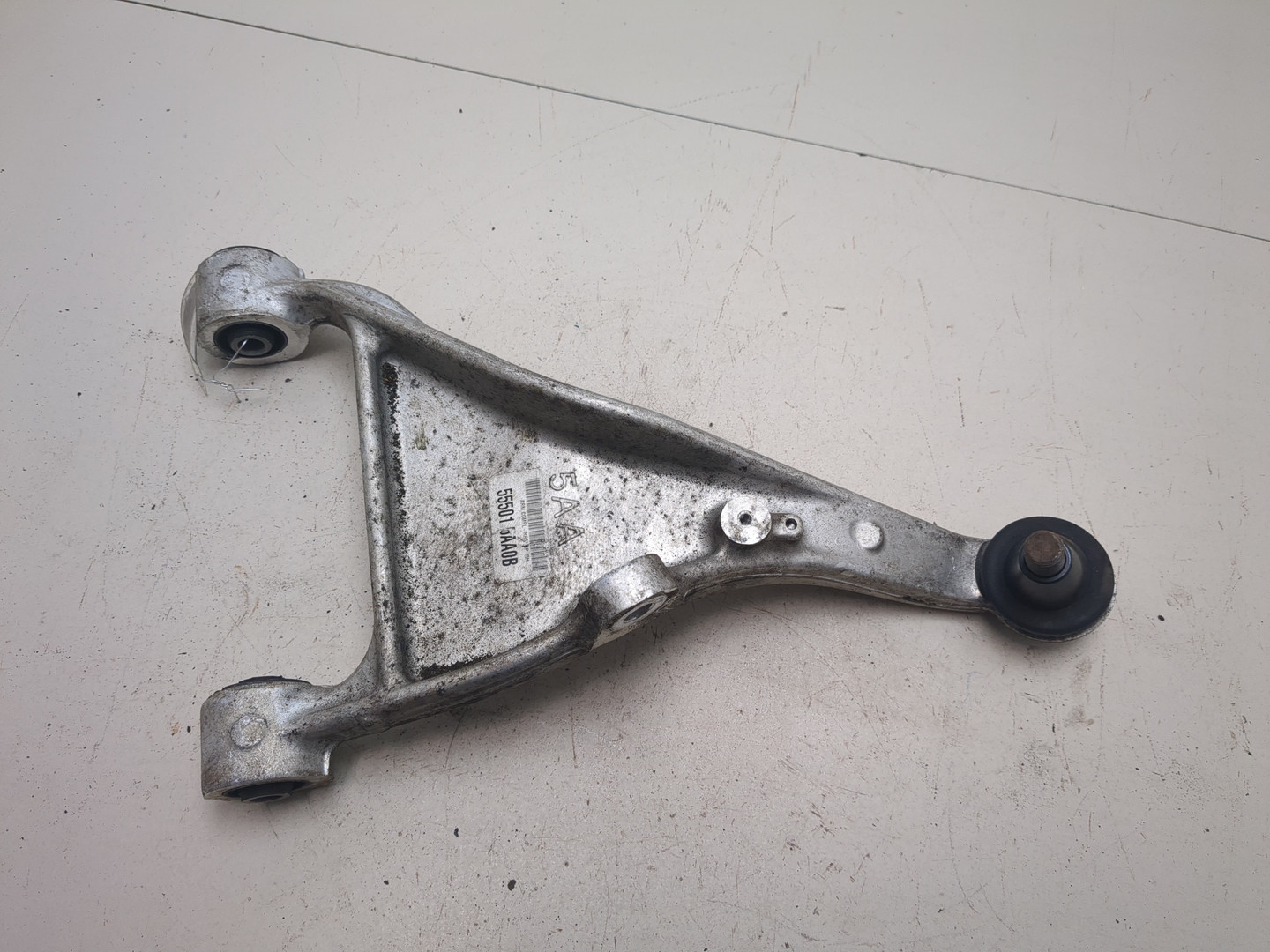 Рычаг задний левый