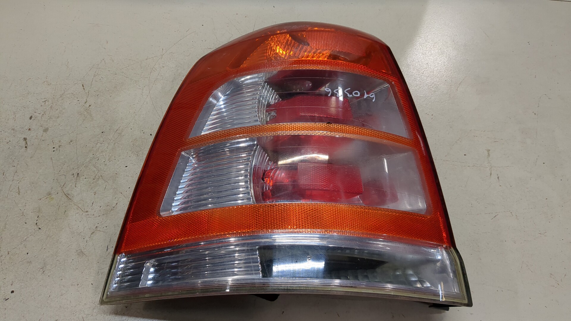 Фонарь задний левый