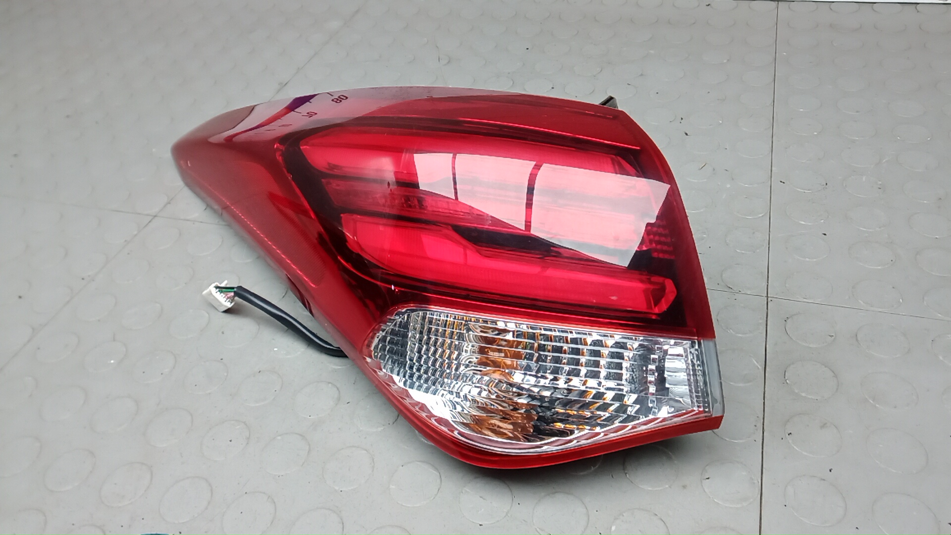 Фонарь задний левый