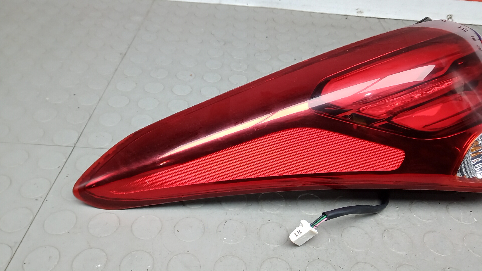 Фонарь задний левый