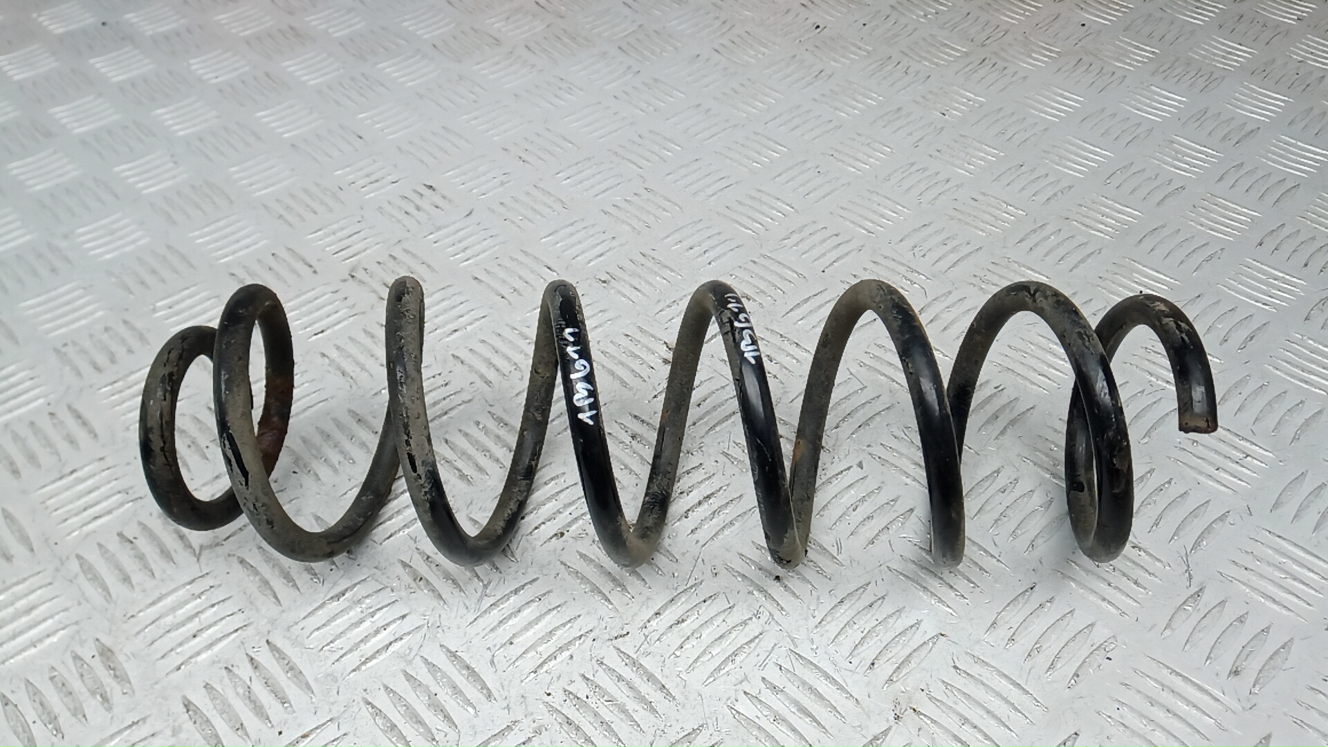 Пружина задняя