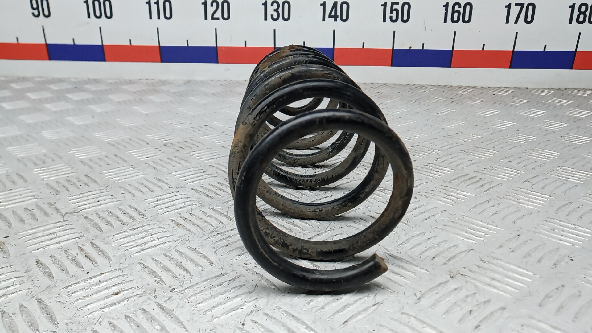 Пружина задняя