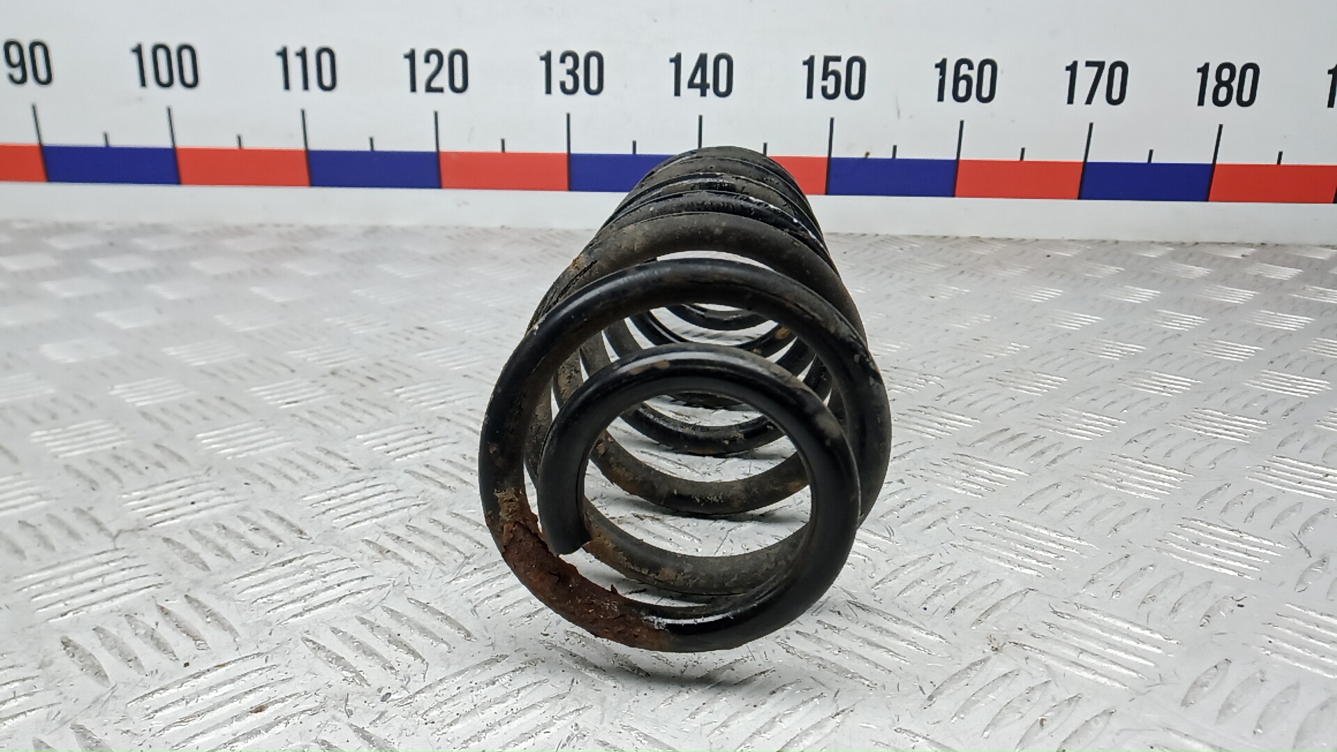 Пружина задняя