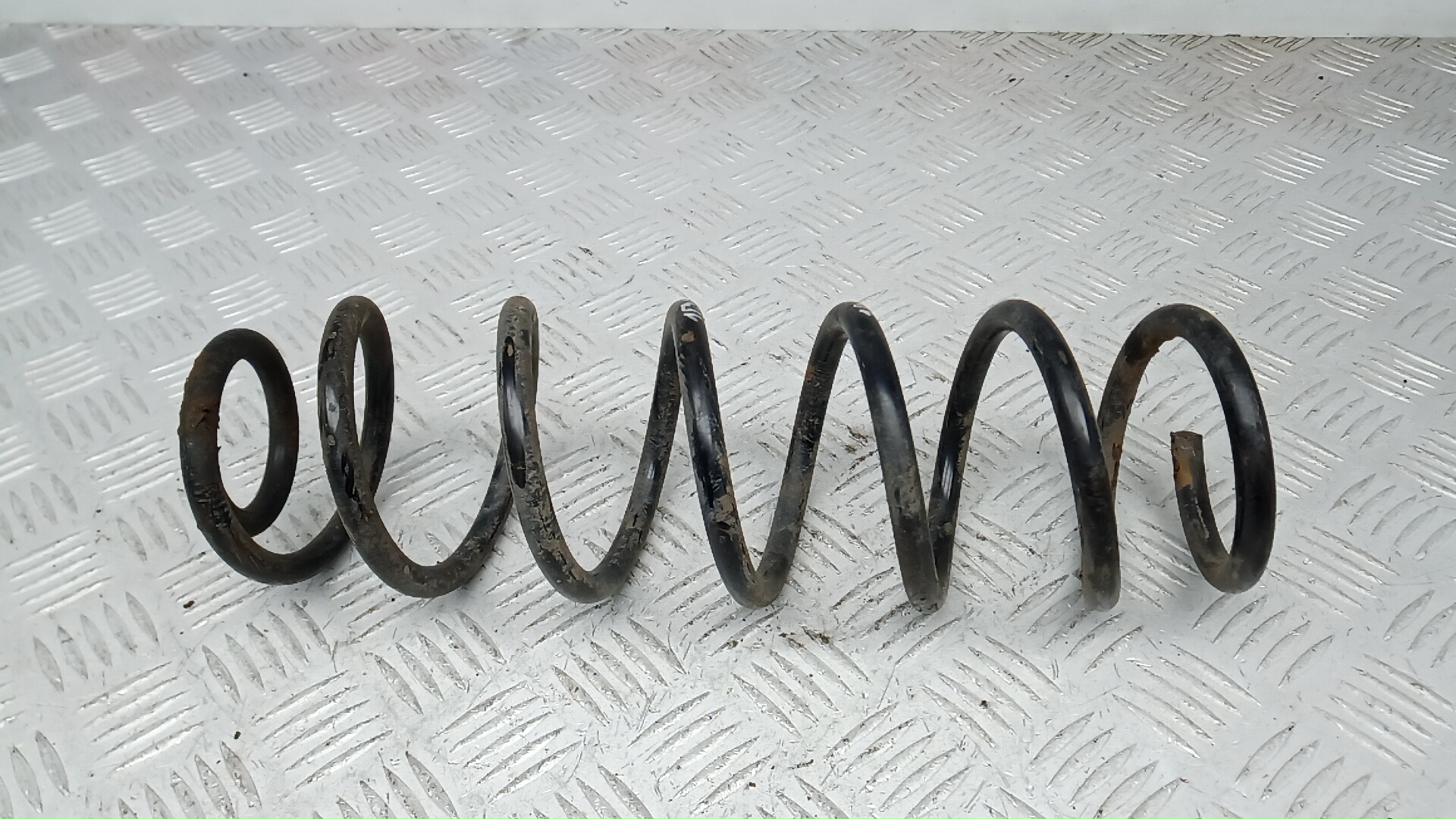 Пружина задняя