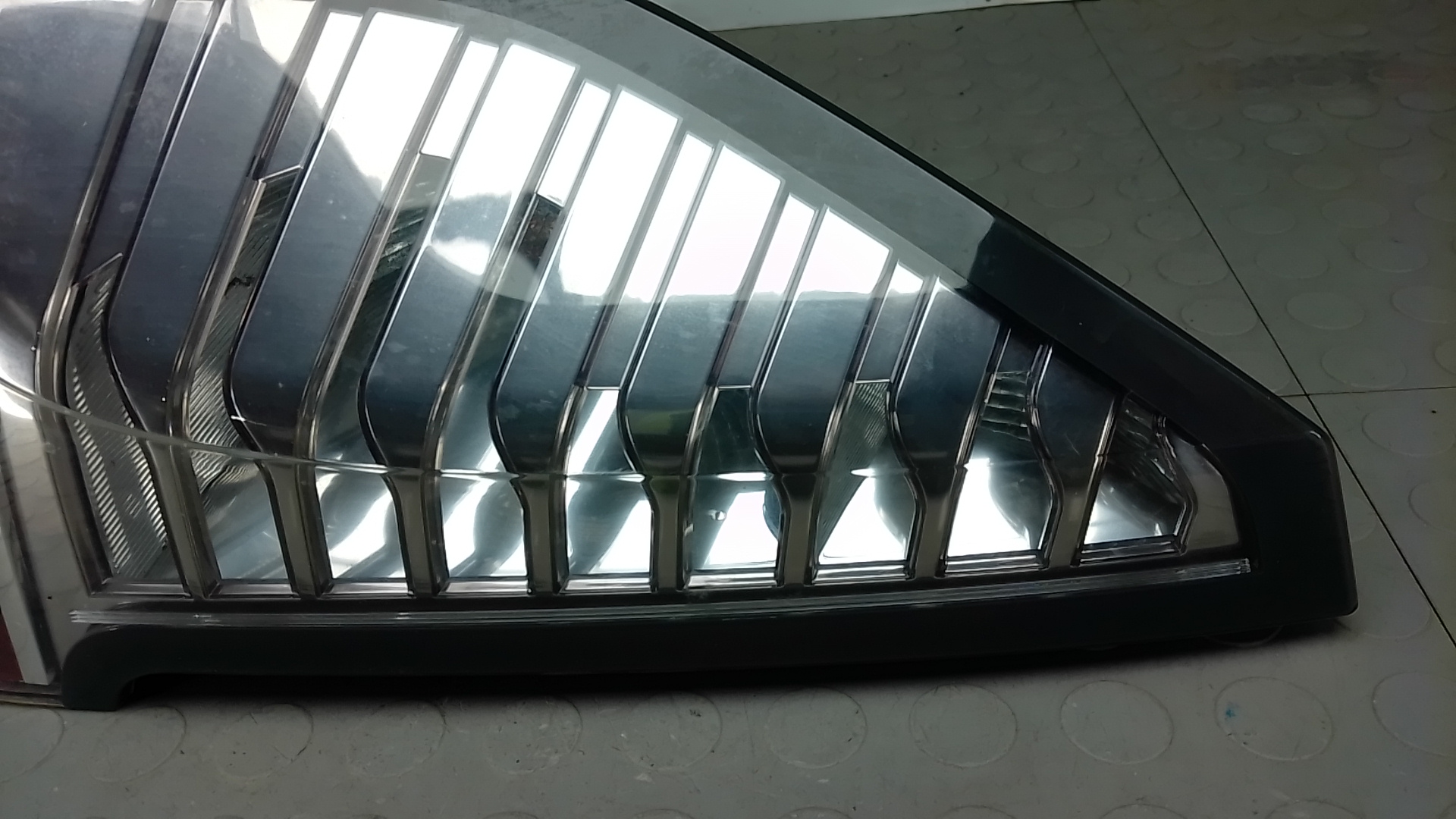 Фонарь задний левый