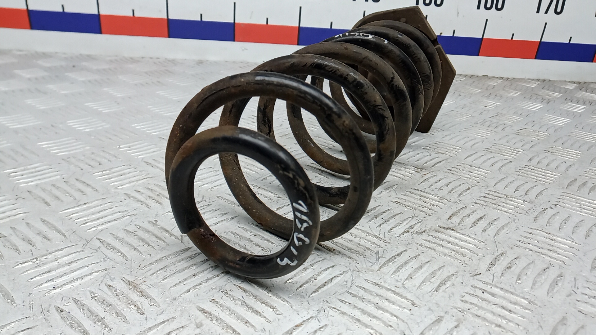 Пружина задняя