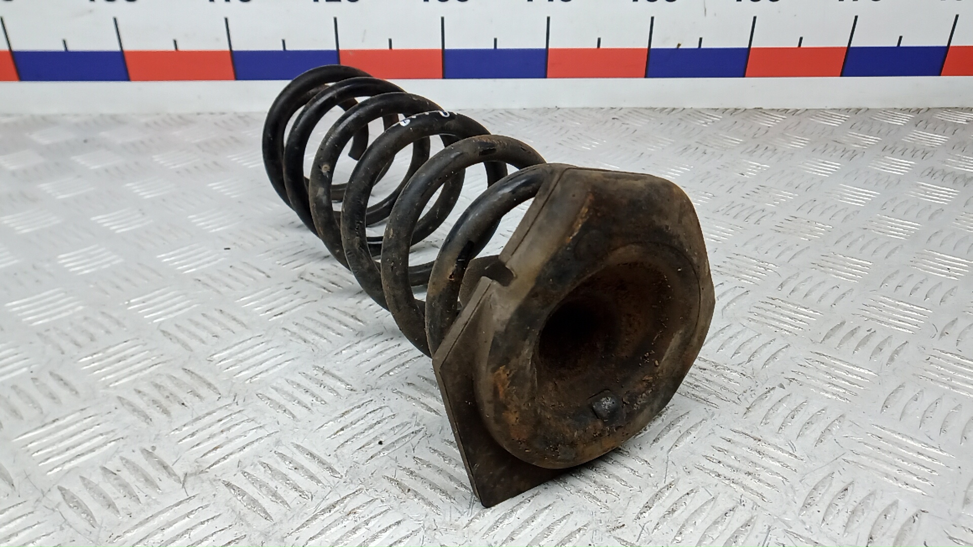 Пружина задняя