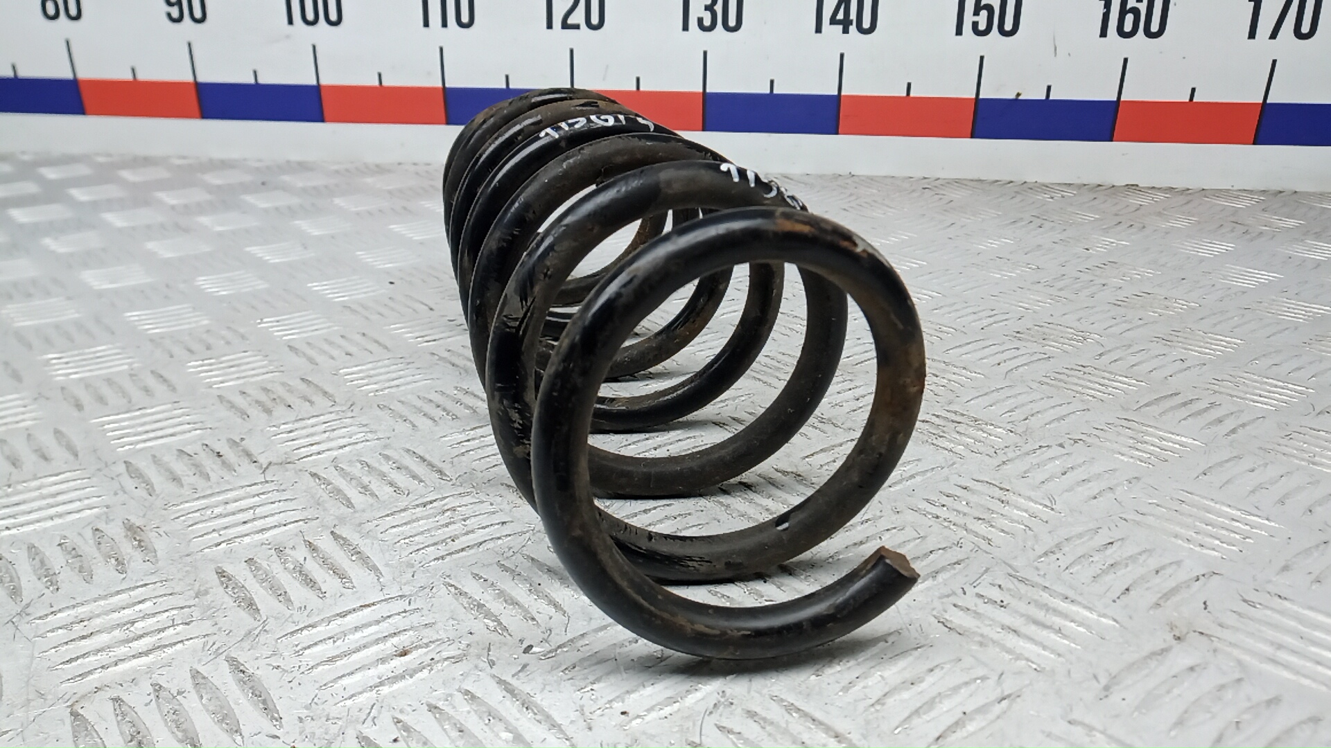 Пружина задняя