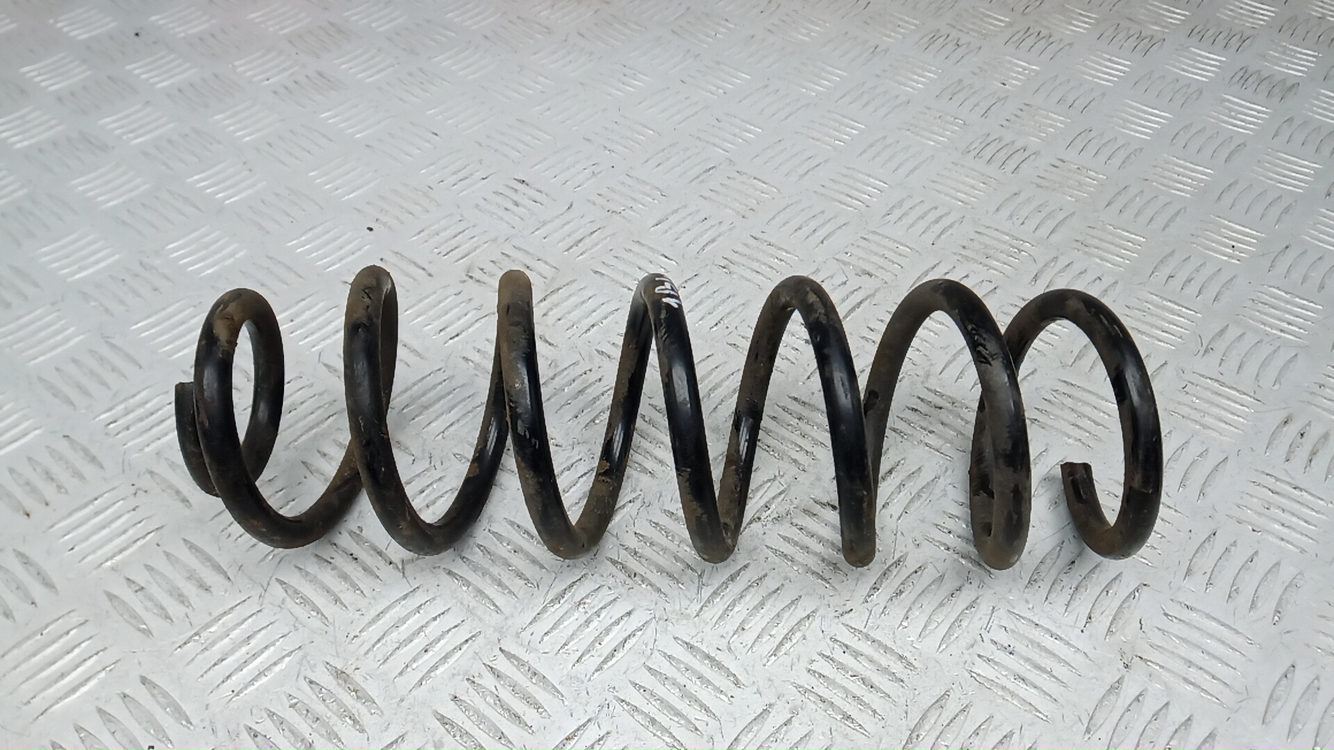 Пружина задняя