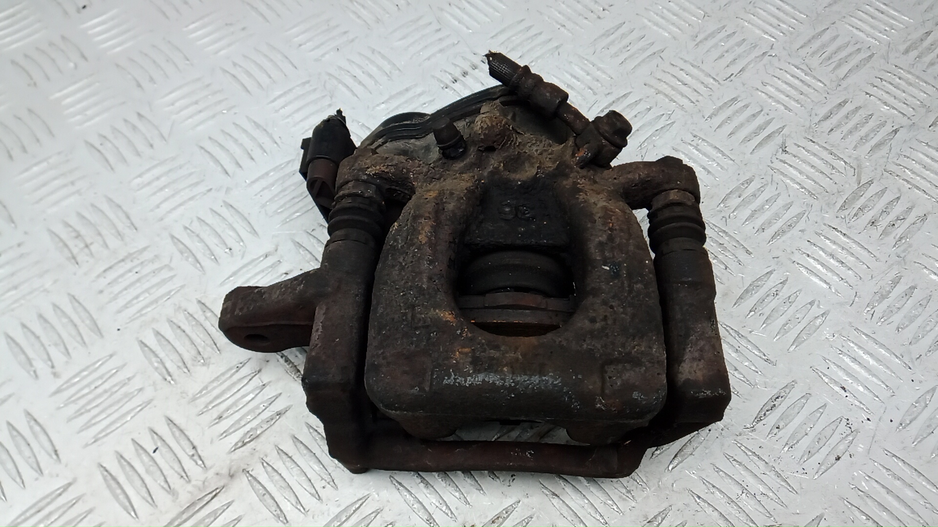 Суппорт задний левый