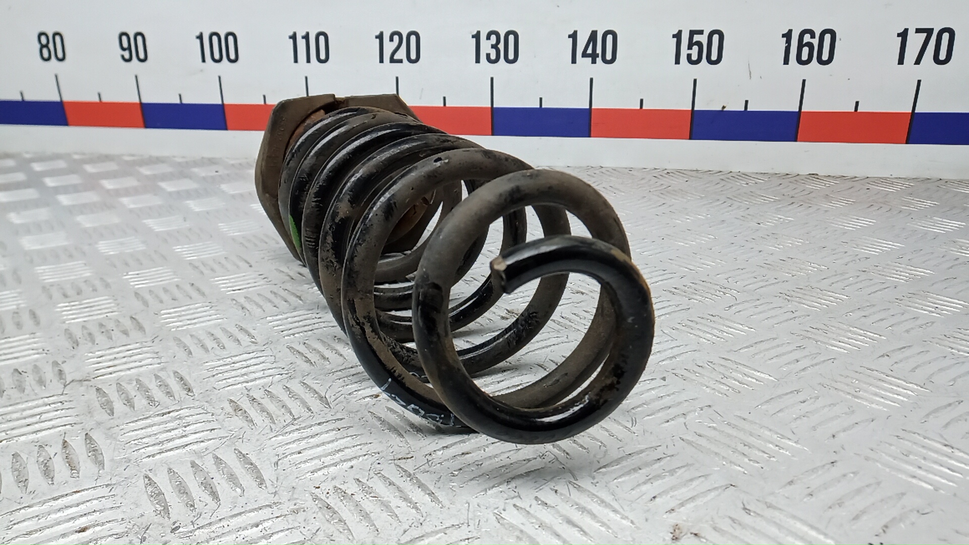 Пружина задняя