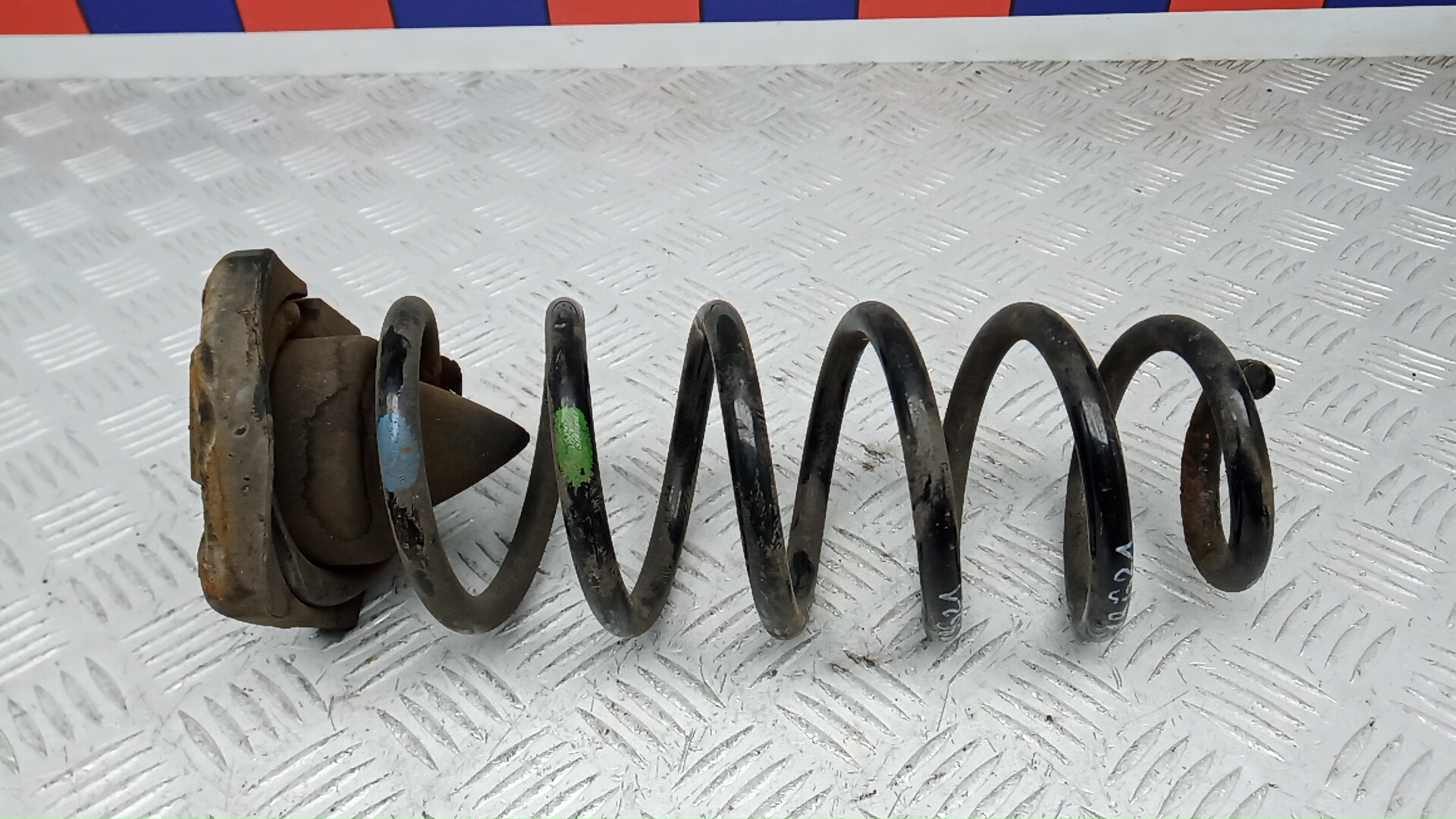 Пружина задняя