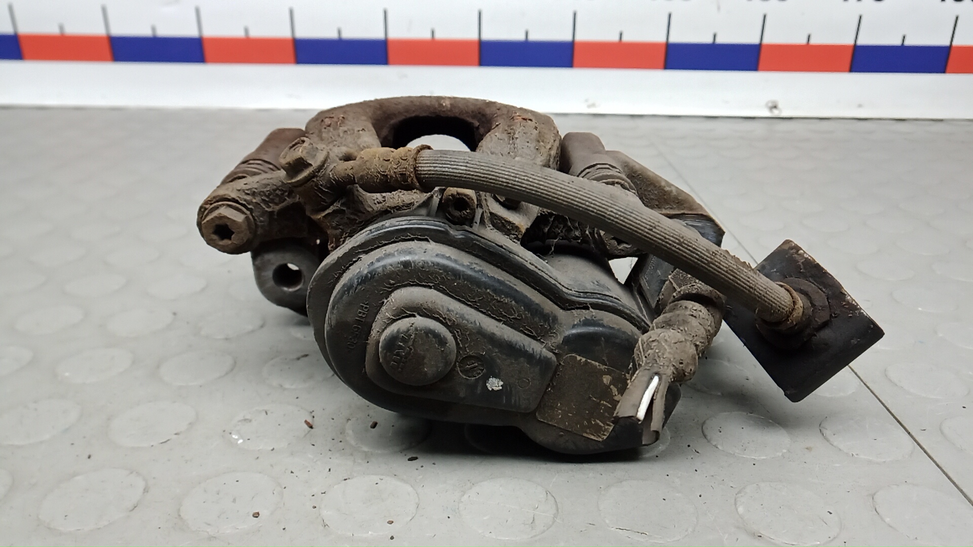 Суппорт задний левый