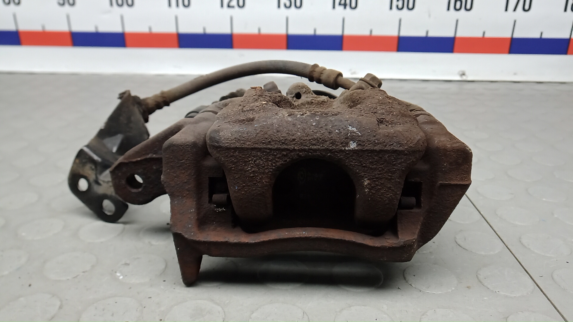 Суппорт задний левый