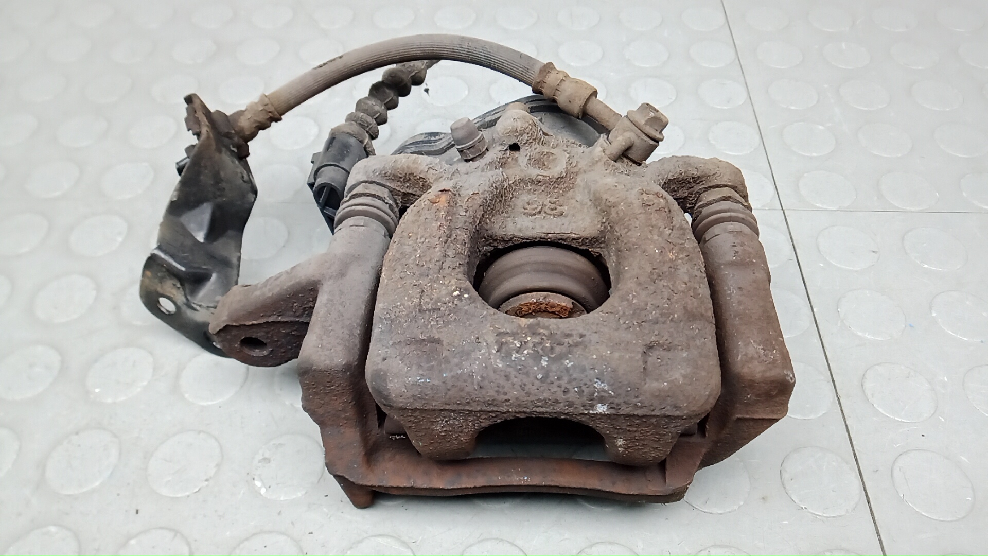 Суппорт задний левый