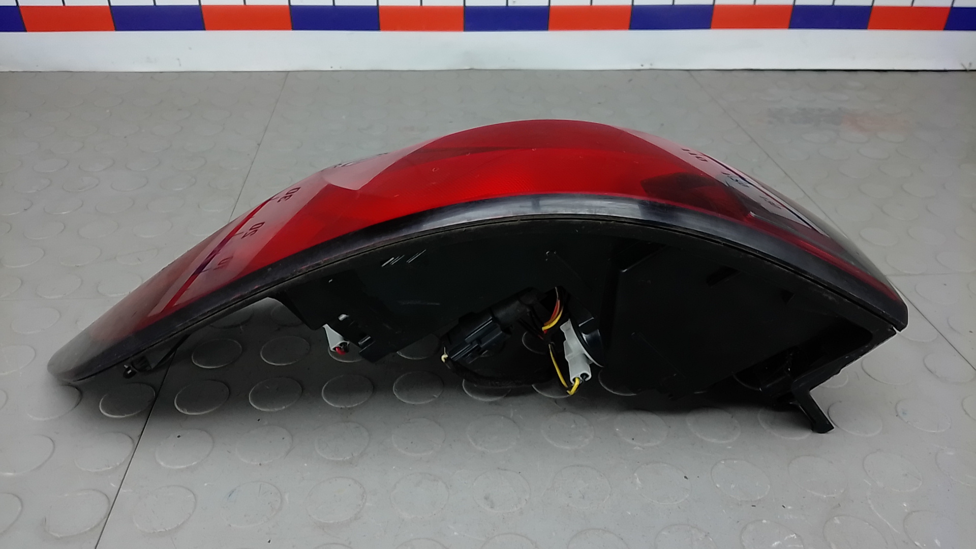 Фонарь задний левый