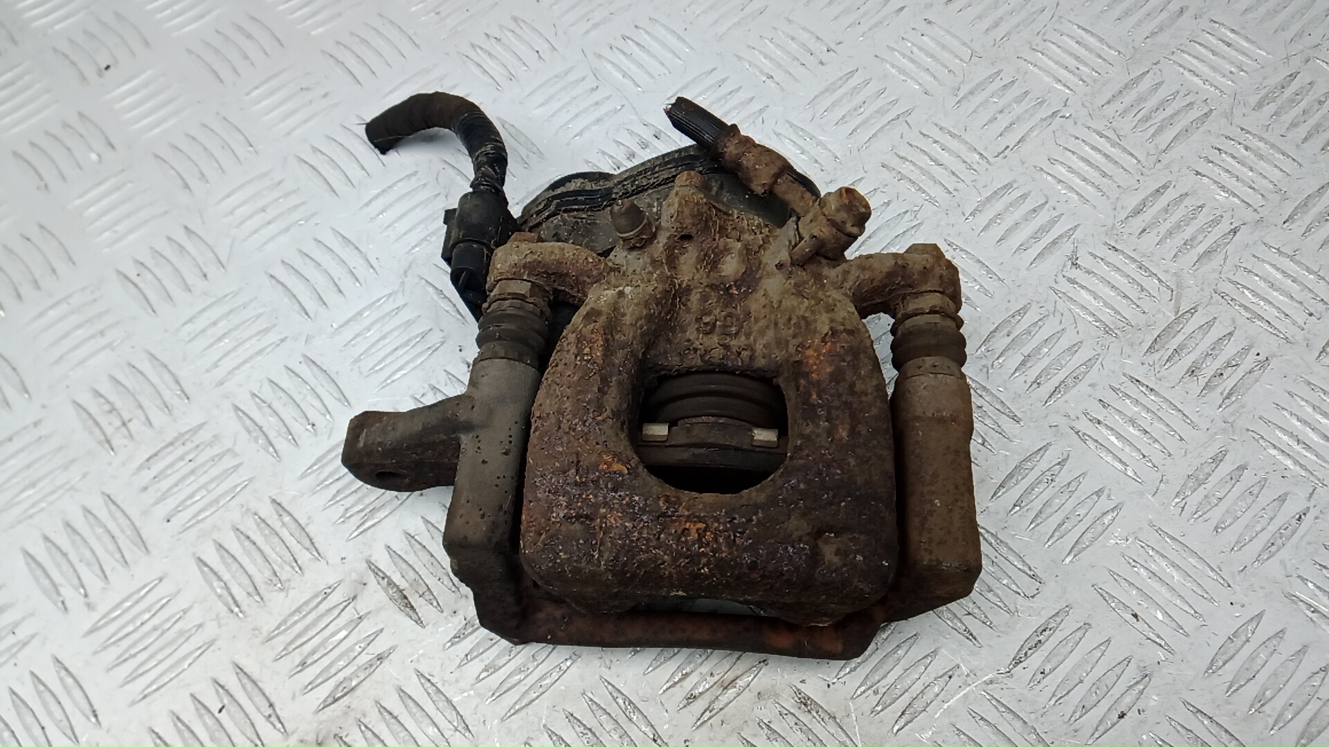 Суппорт задний левый