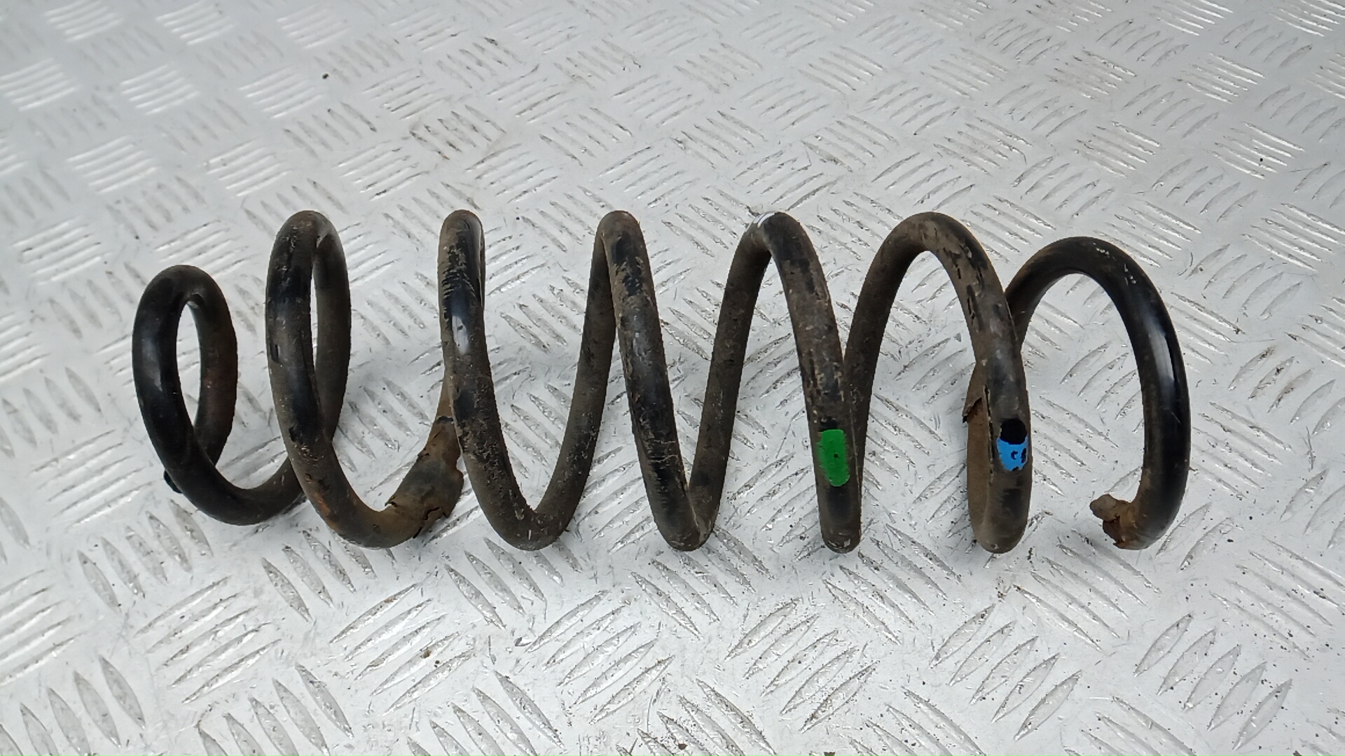 Пружина задняя