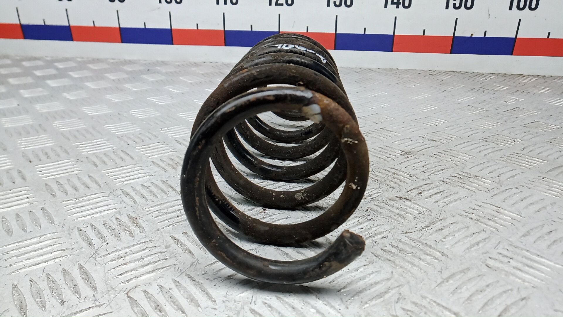 Пружина задняя