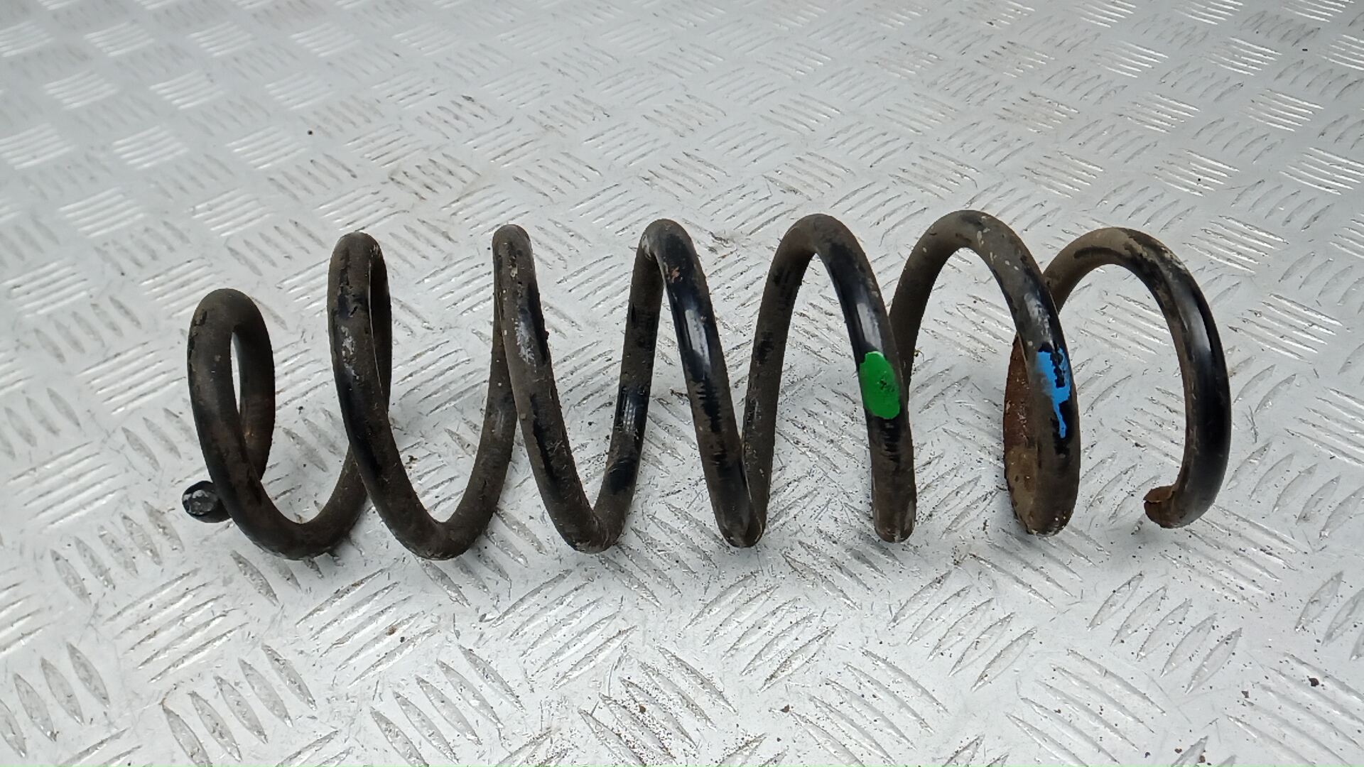 Пружина задняя