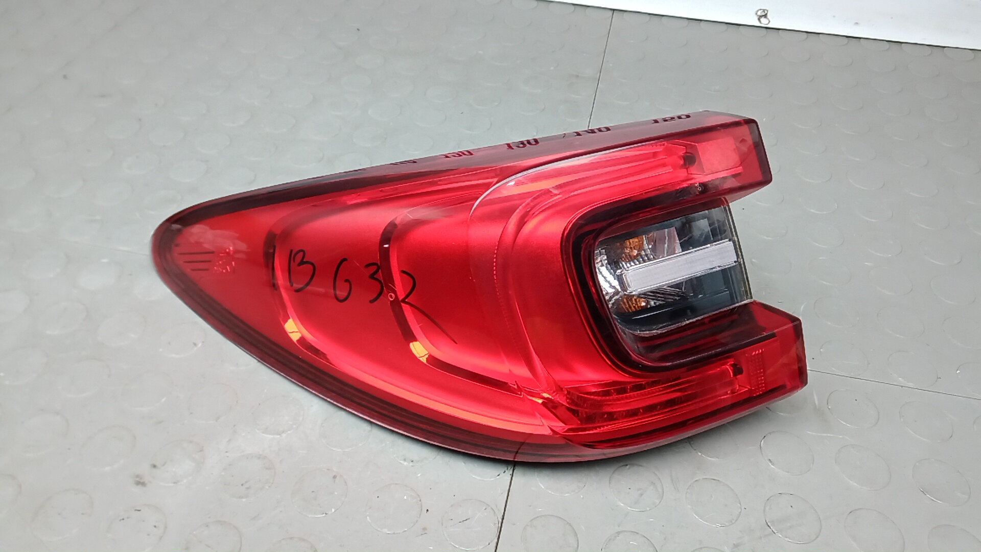 Фонарь задний левый