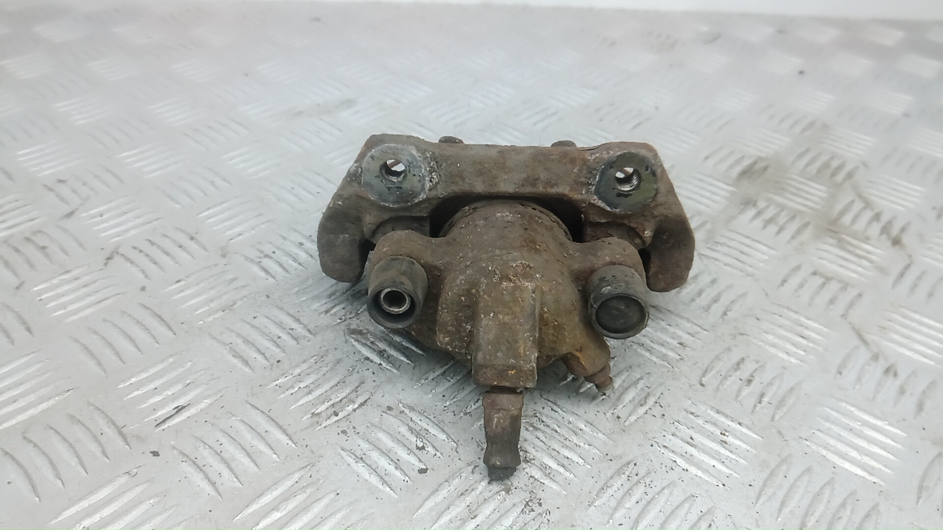 Суппорт задний левый