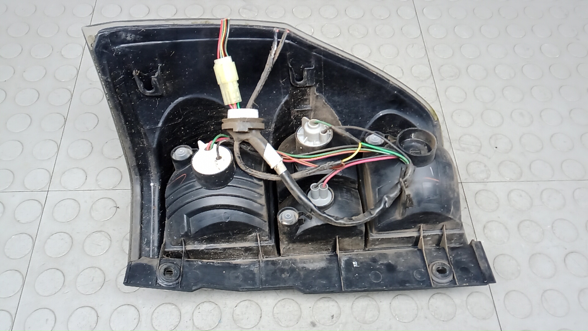 Фонарь задний левый