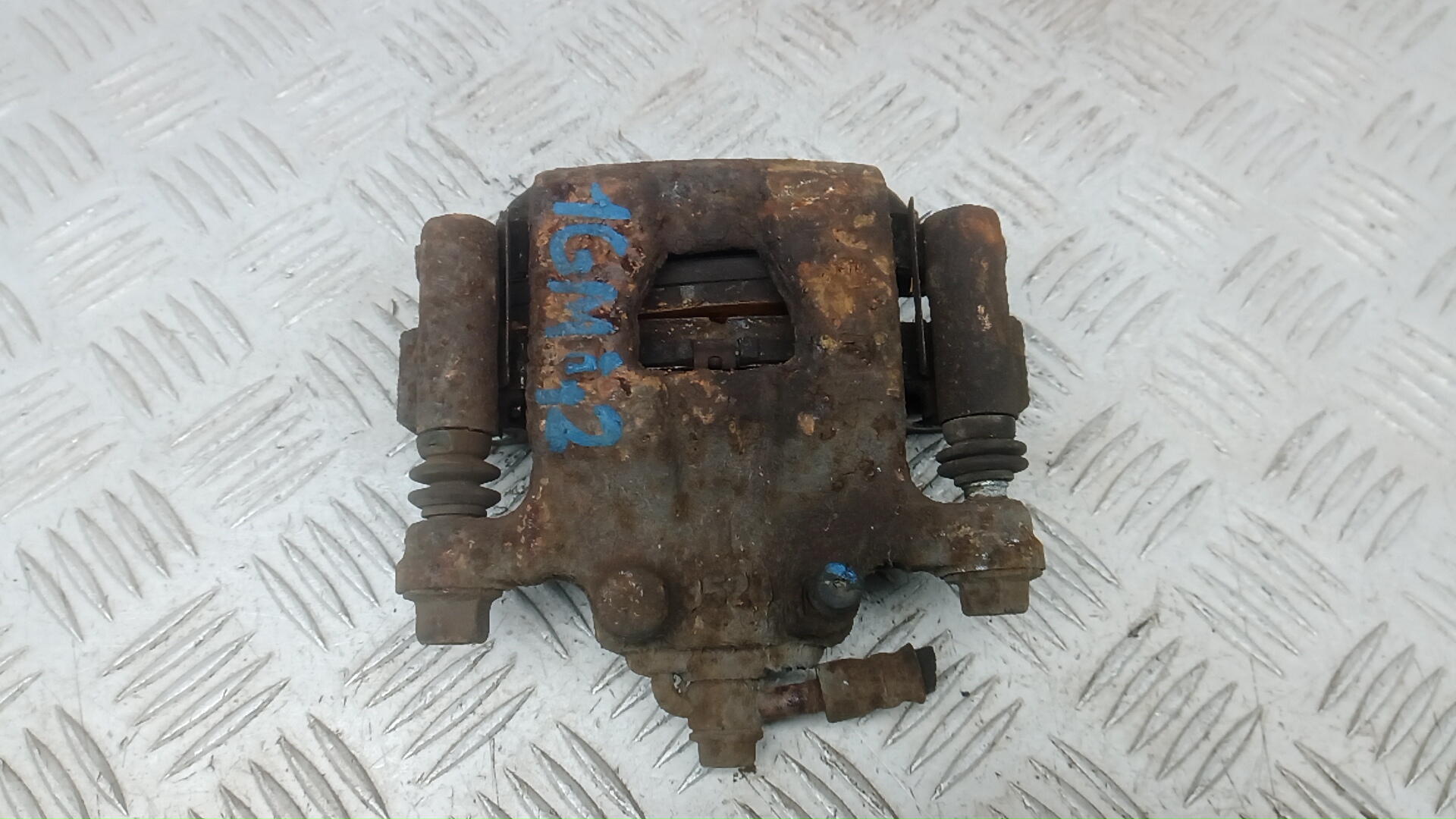 Суппорт задний левый