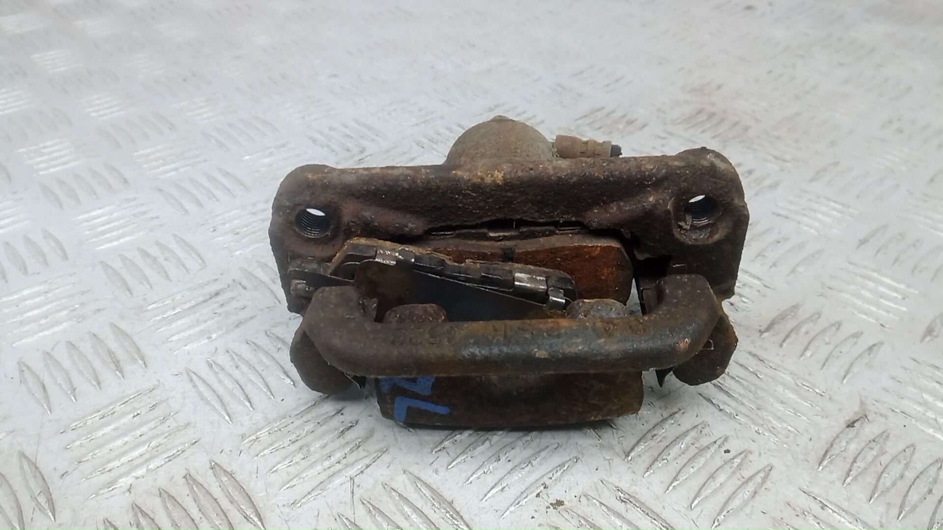 Суппорт задний левый