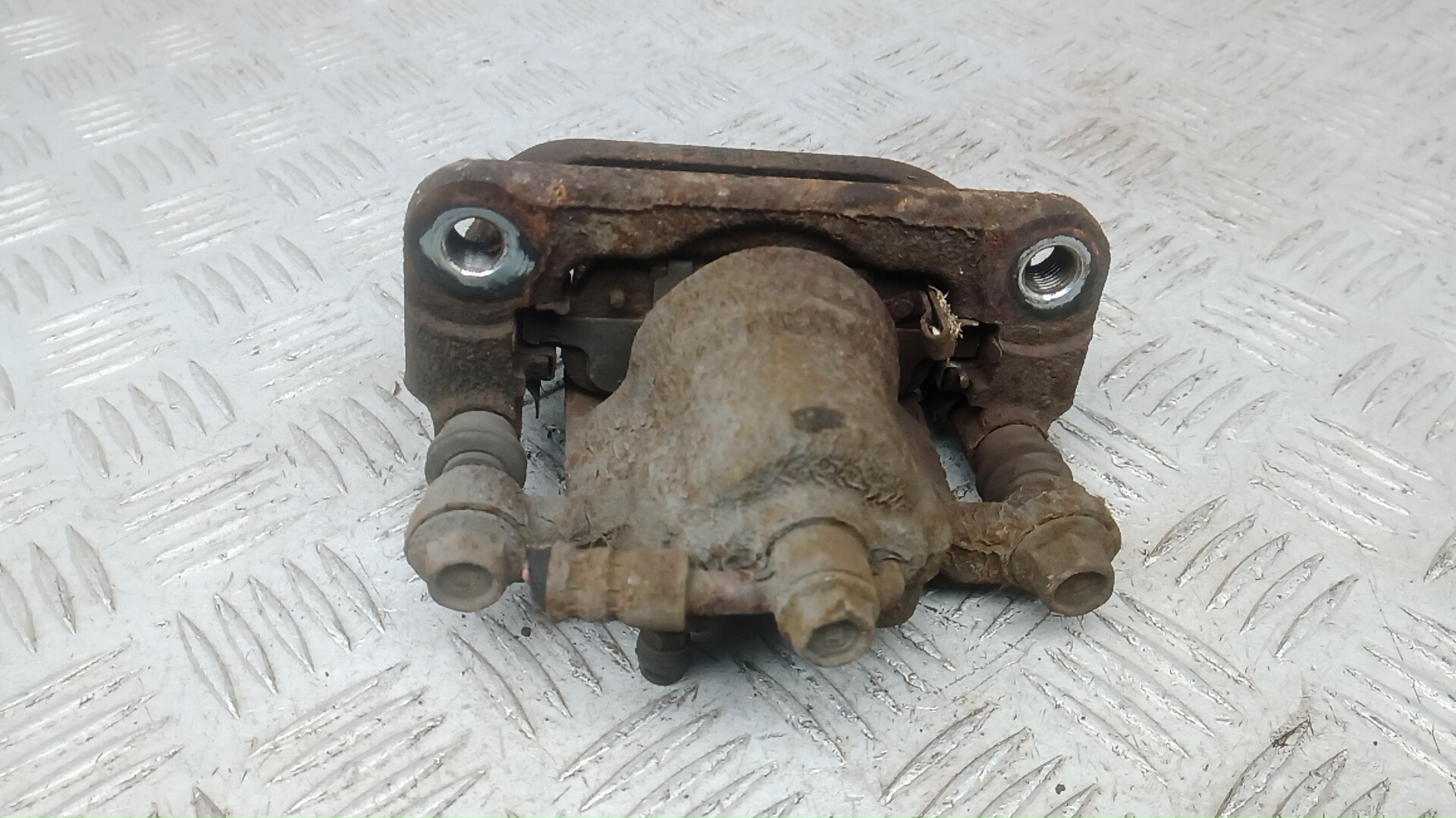 Суппорт задний левый