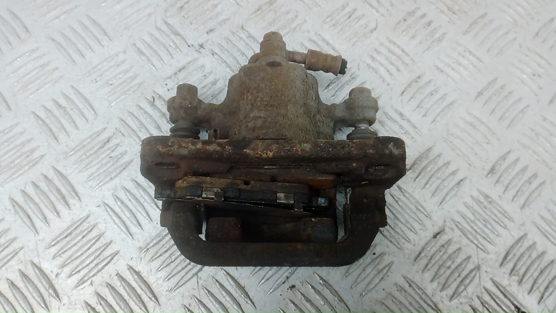 Суппорт задний левый