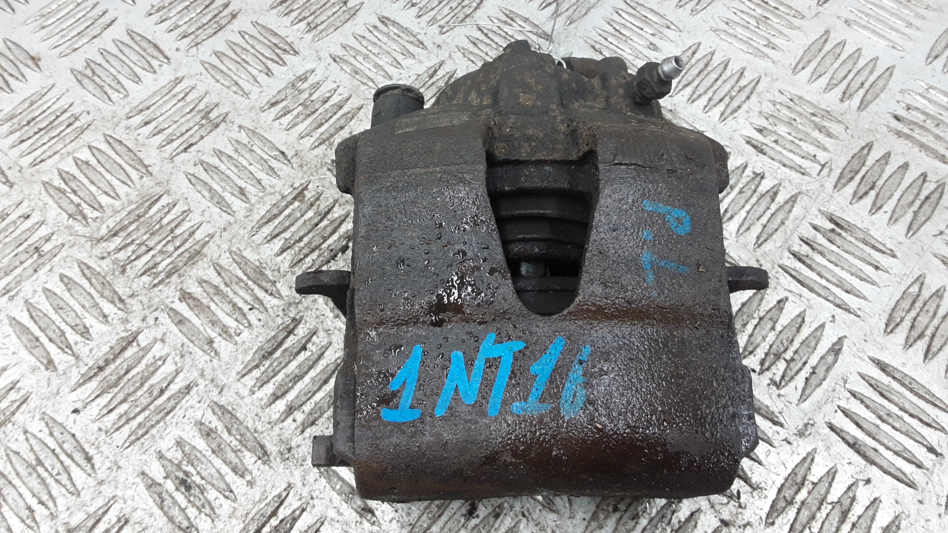 Суппорт передний левый